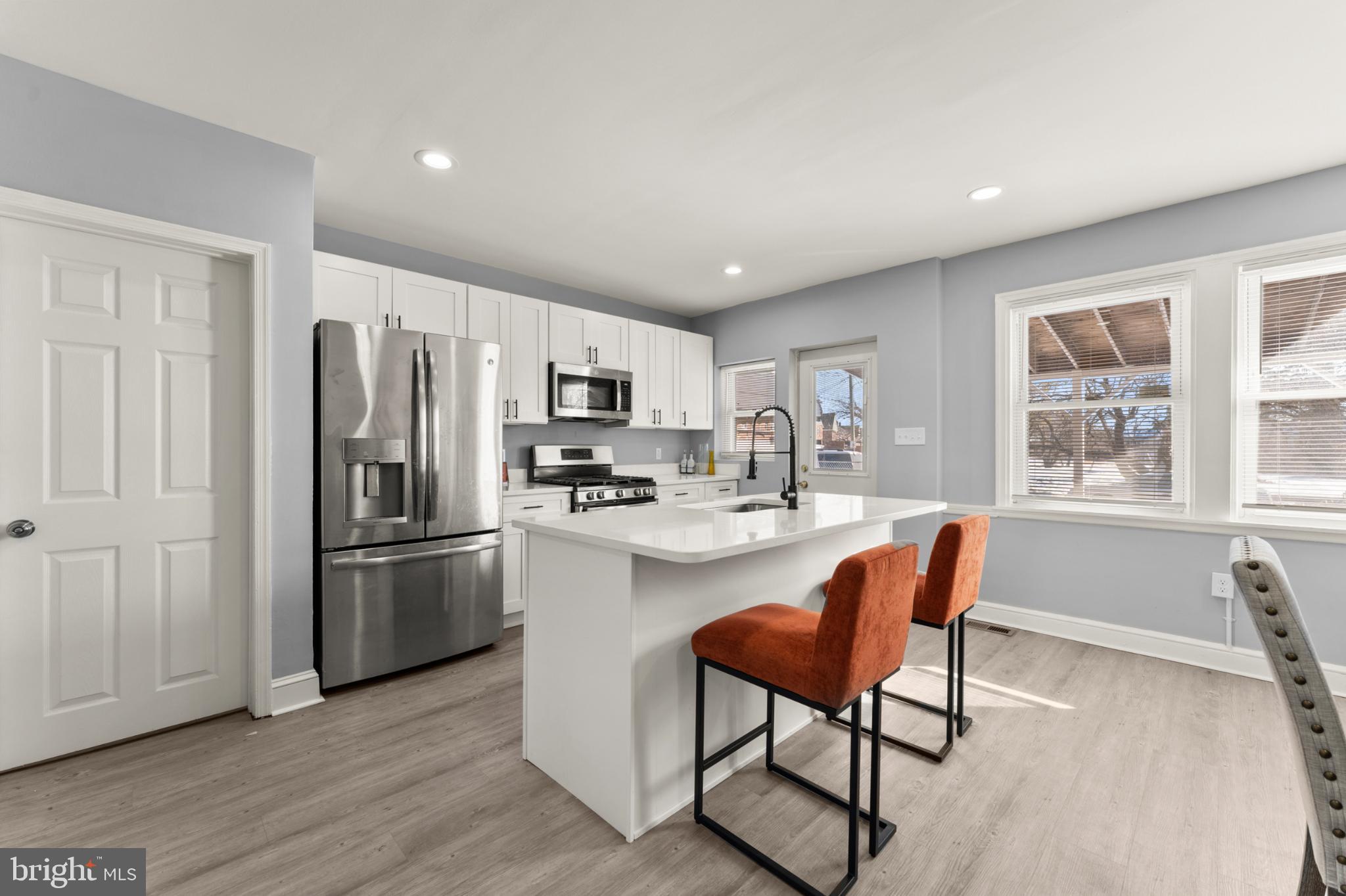 Step inside this move-in-ready gem in the desirable New Northwood neighborhood, where thoughtful updates meet classic charm and modern comfort. Completely renovated just over a year ago, this home feels like new from top to bottom, with all major systems and appliances still practically untouched.

From the moment you arrive, picture yourself welcoming guests on the inviting front porch before entering into a bright and open main level. Luxury vinyl plank flooring flows throughout, creating a clean, cohesive look and effortless living space. The living room transitions naturally into the kitchen, where updated appliances and functional design make meal prep a pleasure. A convenient half bath on the main level adds everyday ease.

Upstairs, discover three comfortable bedrooms and a beautifully updated full bathroom, each room designed for relaxation and privacy. The finished basement extends your living space even further, offering a versatile bonus room, full bath, and recreation area perfect for movie nights, a home gym, or an office.

Every major system has been updated for worry-free ownership: a 1-year-old roof, brand new hot water heater, and nearly new HVAC and appliances mean you can move in with confidence and peace of mind.

Location is everything, just minutes from Morgan State University, the newly reimagined Northwood Commons, grocery stores, and vibrant markets. Enjoy easy access to local farmers' markets, health care centers, shopping, dining, and all the cultural and entertainment offerings of Baltimore. Commuters will appreciate seamless access to major highways, including I-83 and I-695, making trips downtown or throughout the region a breeze.

This home also qualifies for multiple buyer assistance programs, including City and State down-payment and grant opportunities, enhancing affordability for first-time buyers and move-up buyers alike.

Move in, unpack, and start living the lifestyle you’ve been waiting for. This one truly checks all the boxes!