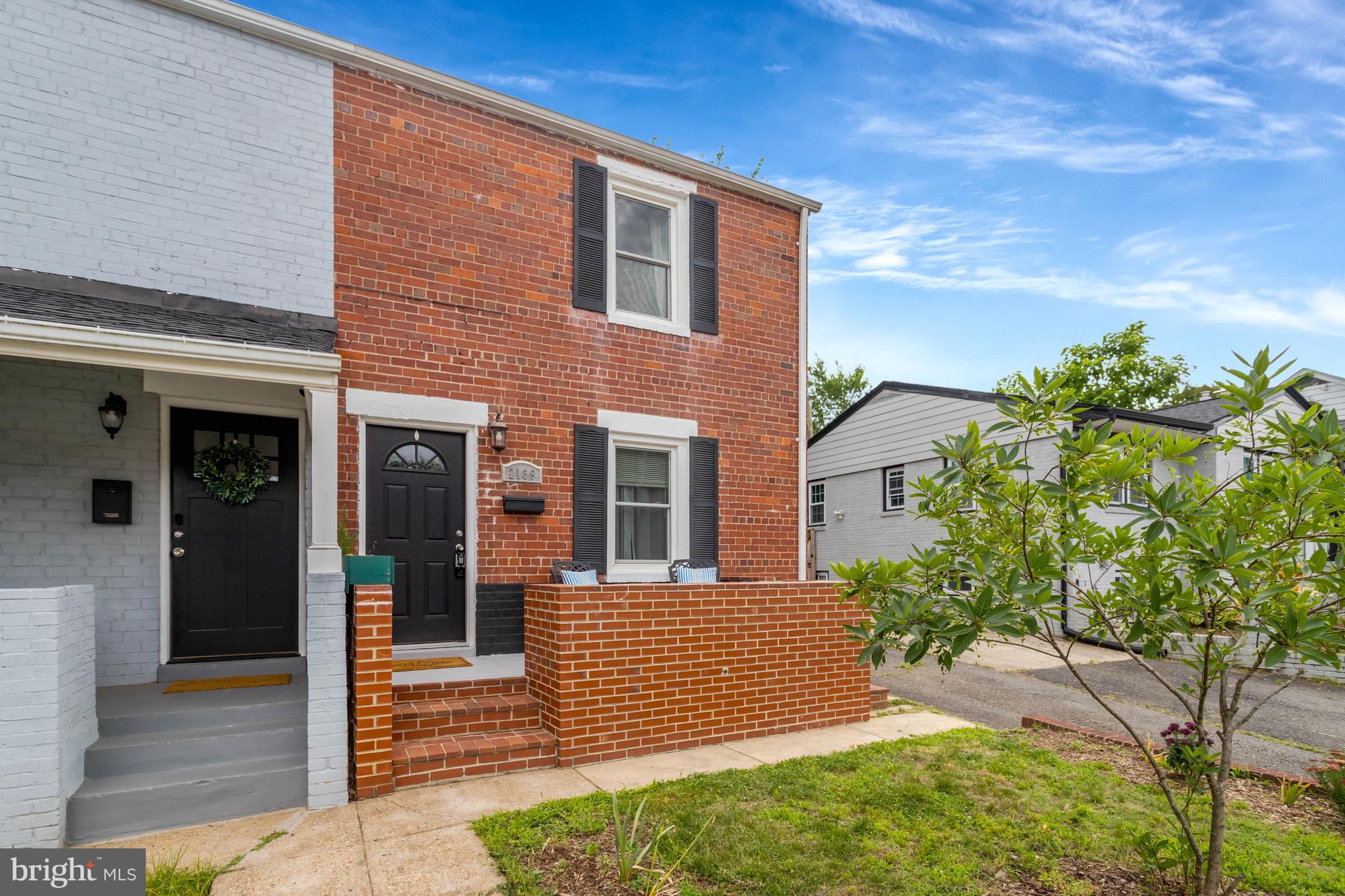 Welcome home to 2139 S Oxford Street! This charming, move-in ready semi-detached home was renovated in 2020 and further enhanced with the addition of a second full bath in 2025 — delivering 3 bedrooms, 2 full baths, and flexible living space across three levels. 
Step onto the welcoming front porch and into a bright, airy living room — the perfect setting for relaxing or entertaining. The living area flows naturally into a generous dining room, creating an open, connected feel throughout the main level. The dining room leads to an updated kitchen featuring stainless steel appliances, with convenient access to both the backyard and the lower level.
Upstairs, you'll find two bedrooms with hardwood floors and a beautifully updated full bath. The lower level offers exceptional versatility — a large room suited for recreation, a home office, or guest bedroom, along with a laundry area and a spectacular newly added full bath. Direct access to the rear yard adds even more functionality to this flexible space.
Outside, enjoy a fully fenced backyard offering privacy and plenty of room for outdoor enjoyment, along with a large shed perfect for hobbies or extra storage. A short stroll to the end of the block brings you to Fort Barnard Park and Dog Park, while Shirlington's vibrant international dining scene is just minutes away. With easy access to I-395, public transportation, and the region's major airports, 2139 S. Oxford Street delivers the best of suburban comfort and urban convenience.