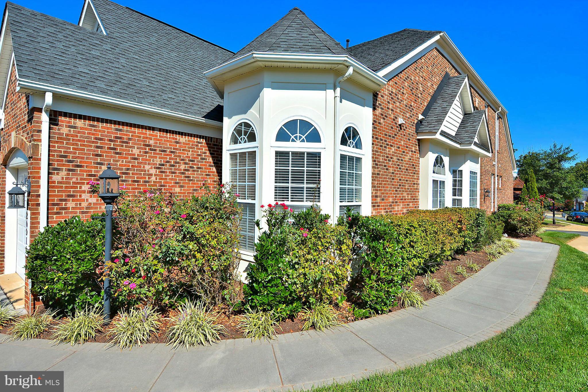 RARELY AVAILABLE END UNIT PATIO HOME WITH A TREMENDOUS AMOUNT OF LIGHT!  HIGHLY DESIRED 55+ COMMUNITY WITH FABULOUS STYLE, AMENITIES AND CONVENIENT LOCATION!  LARGE MODEL WITH FINE FEATURES INCLUDING HARDWOOD FLRS, GRANITE/STAINLESS/MAPLE KITCHEN, ELEGANT SEP DINING ROOM, AND LOVELY MASTER SUITE W/LARGE MSTR BATH & W/I CLOSET.  MN LVL FAMILY ROOM PLUS AN OPEN LOFT AND EXTRA BD & BA UP! 2 CAR GAR!