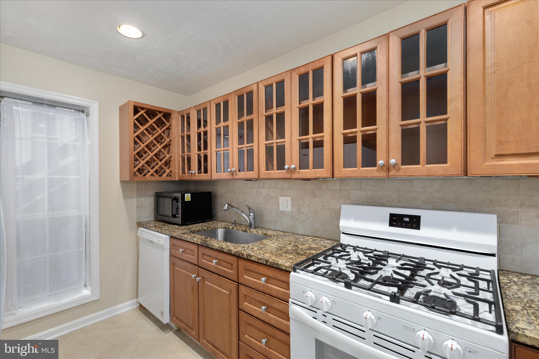 This fully updated 1-bedroom, 1-bath condo offers a turnkey opportunity in a highly convenient Oakton location. With 826 sq. ft. of living space, this condo packs a punch with a long list of recent upgrades that make it completely move-in ready. Brand new carpet and fresh paint create a clean, modern feel, while the updated kitchen features a new dishwasher, stove, refrigerator with ice maker, and disposal. A new HVAC system adds peace of mind, and engineered hardwood flooring brings both durability and style to the space. Simply unpack and enjoy. ***

Perfectly positioned for convenience, this condo offers easy access to everything Northern Virginia has to offer. Commuters will appreciate proximity to the Vienna Metro Station, major routes including I-66 and Route 50, and both Washington Dulles International Airport and Reagan National. Everyday essentials, dining, and shopping are just minutes away at Fair Oaks Mall and Fairfax Corner. ***

This location is also ideal for those in the medical field, with Inova Fairfax Hospital just a short drive away, as well as countless nearby healthcare and professional hubs. Situated within the highly sought-after Oakton High School pyramid, this is an excellent opportunity for both homeowners and investors alike. ***

Whether you're a first-time buyer, downsizing, or seeking a low-maintenance lifestyle in an unbeatable location, this “small but mighty” condo delivers exceptional value and convenience.