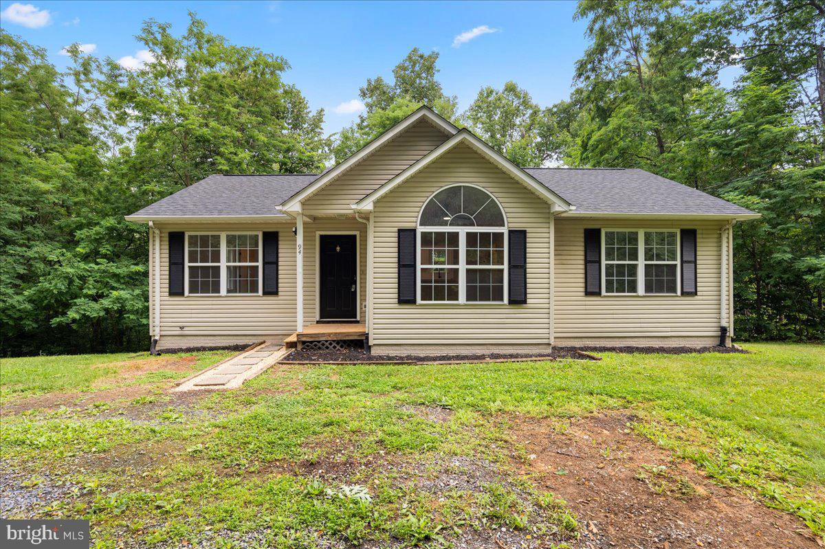 You must see Tee.  This 3 bed 3 full bath home has 1.76 acres with extensive privacy.  The property has received some very welcomed improvements such as:  New Architectural roof, HVAC, Water Heater, LVP Flooring, Kitchen - Quartz Countertops - Cabinets - Stainless Steel Appliances, Fully renovated bathrooms (3), Gravel on driveway, and Fresh paint to tie it all together.  Located on a small paved street with 8 homes with no through traffic.  Enjoy all this home has to offer while only being 7-10 minutes to Rt. 55 to get into town or onto 66.
