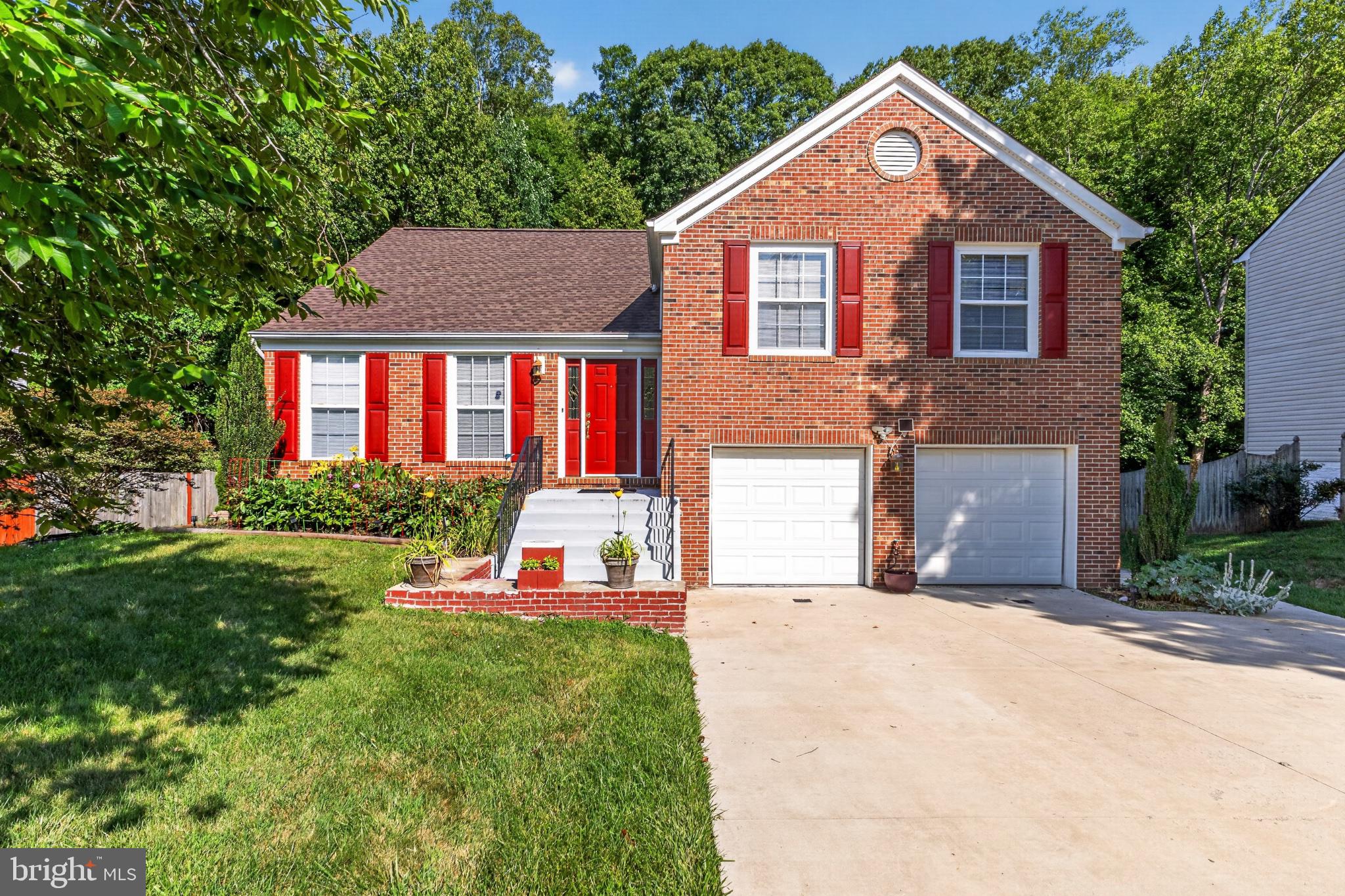 Exceptional opportunity to own a gorgeous brick 3 level home home located in the well desired community of Stonebridge at Widewater.  This beautiful 4-bedroom, 3 full bathroom and 2 car garage home provides over 1800 sqft of quality living on .29 acres, boasting a surreal setting full of lush woods, a manicured lawn, mature trees, and unmatched landscaping.  Main level provides a huge family room enriched with natural lighting, high ceilings, and hardwood floors.  Upper level continues to feature hardwood flooring, an updated kitchen boasting upgrades like granite countertops, stainless steel appliances and large cabinets offering ample storage.  Enjoy the ambient lighting in the large dining room, which is perfect for families of all sizes especially since you have access to oversized deck overlooking the fantastic backyard.  Upper level also hosts 2 large bedrooms with updated closets, spacious full bathroom, and a spacious primary suite with an en-suite.  Fully finished walkout lower level offers an additional large family/recreational room, a full bathroom, and a spacious bedroom.  Enjoy the lower level walkout to the finished and covered patio, which is equipped for all weather occasions, including a fully functioning outdoor fireplace perfect for cooking or hosting gatherings for the entire family.  As a bonus, the 2-car garage offers a huge area for additional storage—large enough to store just about anything and everything so you can actually use the garage to park your cars.
This home is perfectly situated within 10 miles of Quantico, offering convenient access to I-95, VRE and commuter lots.  Also, located minutes from retail shops, grocery stores, medical services, banking, restaurants and more.
New Roof -2023
Concrete Driveway-2023
Kitchen&countertops-2017
Washer and Dryer -2023 
Hardwood floors-2017
Floors is bathroom 2023
Waterheater -2018
HVAC-2006 
CEMENT PATIO 2020 
Built in Grill -2021
Other features- surge protection & Air Scrubber