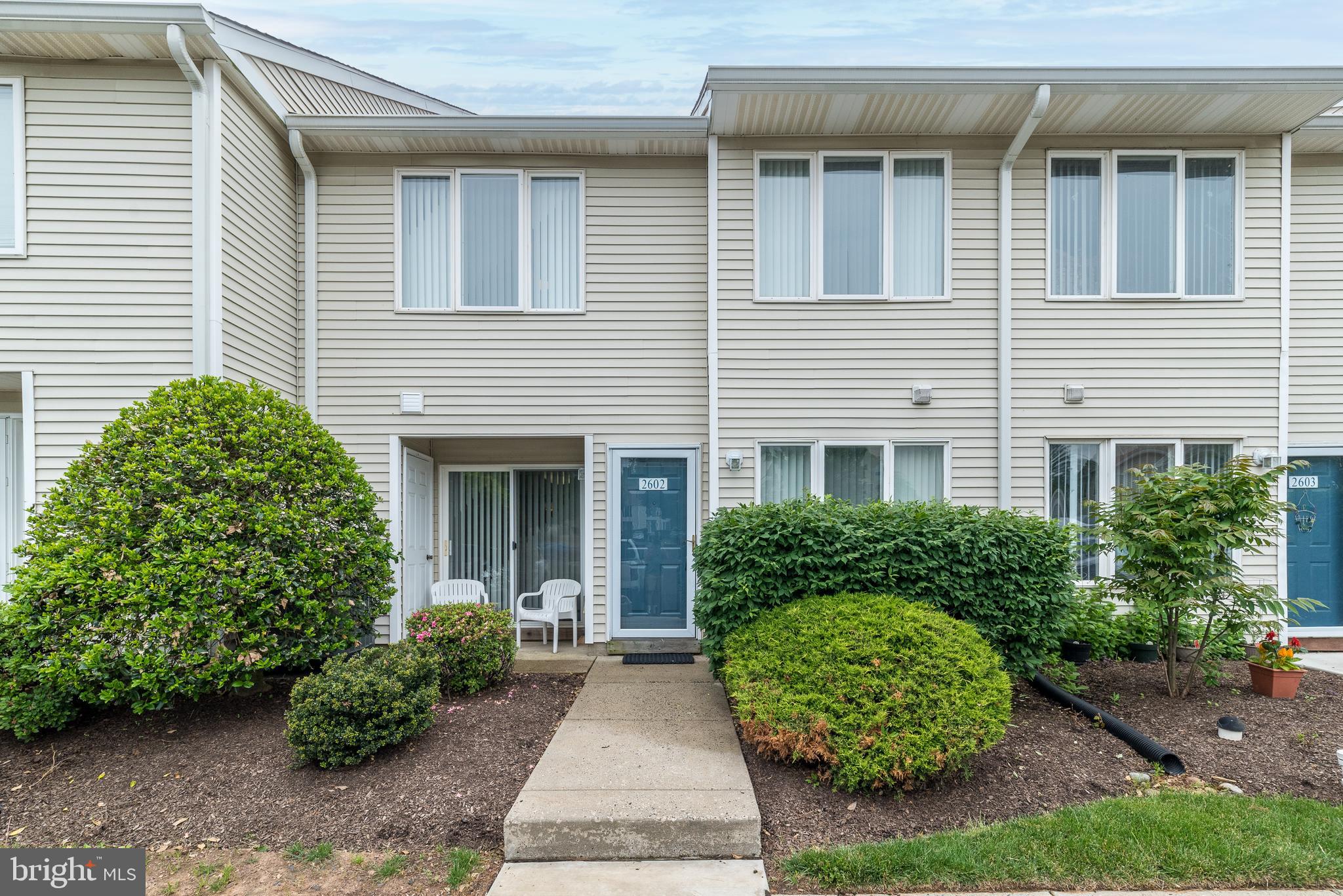 Carefree living awaits you in this much sought after, meticulously maintained, 2 bedroom, 1 ½ bath townhome in popular Montgomery Place. Neutral carpet throughout.  Dining room has access to patio, where you can enjoy a good book or just relax. Outdoor storage closet, provided for your convenience. Eat-in kitchen, with breakfast bar, spacious sunlit living room, powder room and laundry area complete the first floor. Move upstairs to find a super spacious primary bedroom with walk-in closet, ceiling fan and neutral carpet.  Another generously sized bedroom, with neutral carpet and hall bath with double vanity
and linen closet complete this level.
Home is being sold fully furnished.  Hanging prints and art are negotiable.
This wonderful home is conveniently located within walking distance to great shopping &
restaurants, as well as close proximity to major roads and train.
Additional benefits are the Homeowners’ Association fee covers not only common ground
maintenance, exterior building maintenance, lawn care, trash and snow removal to your
front door, roof replacement, and community pool and fitness center. Just move in and
make this home your own! Schedule your showing today!