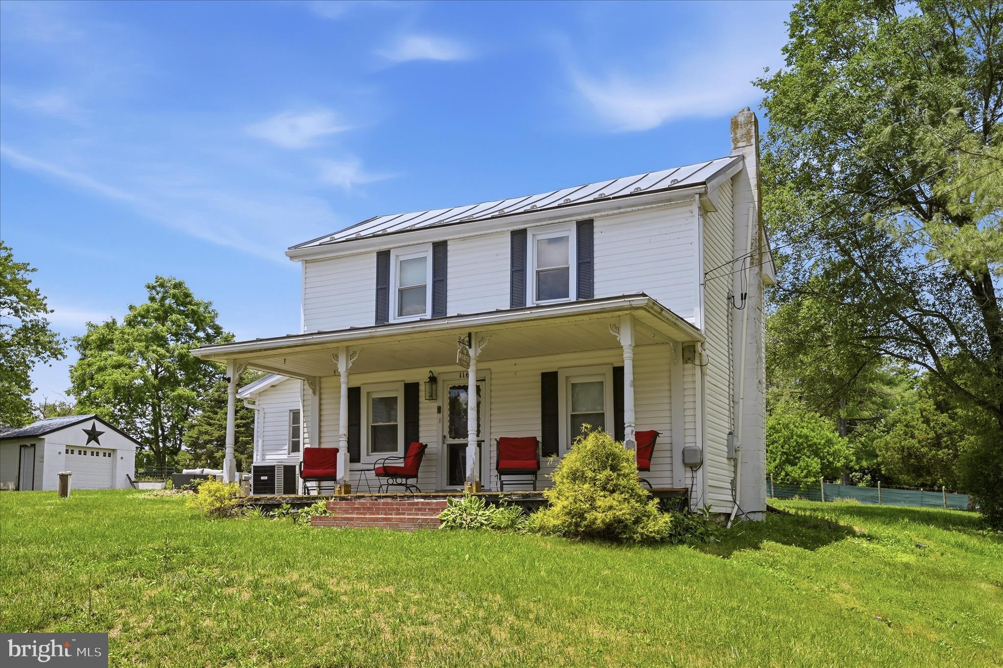 NOW UNDER $300K!!!   This adorable 1930's Farmhouse is full of charm and has loads of potential.  Great "starter", or just a place to get out in the country for a weekend.   The tin roof makes for excellent sleeping on those rainy nights - and the "snow birds" just add to the charm.   A detached garage is there  for storing whatever needs storing, or maybe it would make a great woodworking shop?   3 bedrooms / 1 bath / neatly positioned on .95 acre - and county taxes under $1000 a year!!!  The "mini-split" system offers great comfort for the upper level, while the regular heat pump does its job on the first floor.  Mud room / laundry room located on the first floor, with a relaxing patio just outside the back door.    Located just minutes from I-81, Frederick County Fairgrounds, and Clear Brook Park.   Don't let this little gem slip away... Showings are scheduled between 9:00 am to 6:00 pm.