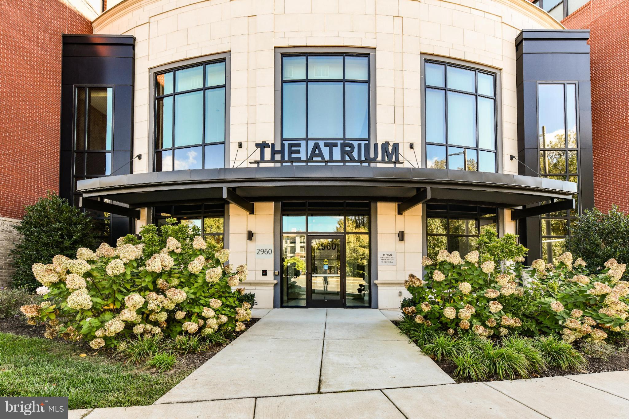 Nestled in the heart of the serene and vibrant 55+ community at The Atrium at Metrowest, this exquisite 2-bedroom, 2-bathroom residence offers a refined lifestyle of comfort, luxury, and convenience. Built in 2020, this beautifully designed mid-rise apartment showcases a contemporary open floor plan that seamlessly blends sophistication with everyday functionality.

Step inside to discover a chef-inspired kitchen featuring upgraded countertops, stainless steel appliances, a spacious island ideal for entertaining, and a water filtration system for pure, fresh drinking water. The gourmet kitchen flows effortlessly into the combined dining and living area, highlighted by elegant recessed lighting and gorgeous hardwood floors.

The home boasts over $15,000 in custom built-in cabinetry—thoughtfully designed to provide smart, stylish storage throughout, while enhancing the beauty and organization of every room.

The floorplan offers both comfort and practicality, with an entry-level bedroom for added convenience and a luxurious primary suite that serves as a true retreat. The primary suite includes a generous walk-in closet and a spa-like bathroom with a walk-in shower.

Beyond the walls of your home, The Atrium at Metrowest delivers resort-style amenities to support a vibrant, active lifestyle. Enjoy year-round relaxation in the heated indoor pool, stay fit in the well-equipped fitness center, or take a stroll along the scenic trail. Socialize with neighbors in the elegant clubhouse and party room, or let your furry friend roam free in the community dog park.

Additional features include: Secure basement garage parking, 24-hour security and on-site resident manager, outdoor courtyard for grilling and entertaining, indoor pool, gym, yoga room, community room, secure storage locker for deliveries, association fee covering water, trash, and lawn care for a truly low-maintenance lifestyle

Perfectly located right next to the Vienna Metro and just minutes from Tysons Corner and the Mosaic District, you'll enjoy easy access to premier shopping, dining, and entertainment. Grocery stores less than two miles away.

This is more than just a home—it's an invitation to embrace a lifestyle of elegance, ease, and community connection. Welcome to The Atrium at Metrowest.