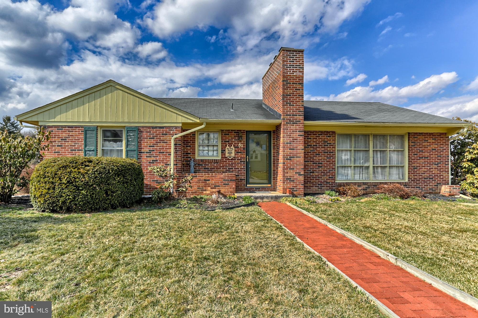 You will love the oversized 3 car garage with alley access!  Large brick rancher with master suite addition.  Spacious rooms, 2 brick fireplaces, finished basement, hardwood floors under the carpet, large screen porch, and a large yard. Recent updates include a new front door, new washer, new garage roof.  House roof installed in 2002. Updated furnace, air conditioning, electric and water heater.