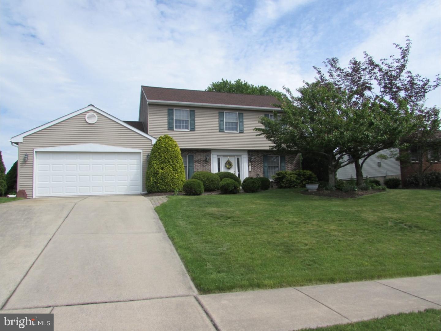 Welcome to this well maintained 2-story Colonial home with 4/5 bedrooms, 2 1/2 bath and 2 fireplaces.  With it's spacious and versatile living area and many updated amenities, you would be proud to call this place home.  The first floor features a 4-season addition with beautiful light from the many windows and also houses an energy efficient Hearthstone gas stove to cozy up to on chilly evenings. This room also has access to the deck through a side door. The adjoining eat in kitchen is adorned with granite counter tops, new flooring and tumbled marble backsplash. The family room, with new carpet and a brick wood burning fireplace, leads to the deck through the new Anderson sliding door.  The deck over looks the back yard with a storage shed for all your tools and toys.  The back yard also features a fire pit for all of your outdoor entertaining with family and friends. In addition, the first floor houses a spacious dining room with hardwood floors, a powder and laundry room as well as a bonus room that could be used as an office, sitting room, hobby room or as a 5th bedroom if needed. The first level of this home has also been freshly painted with the exception of the sun room. The second story houses 4 bedrooms each with a ceiling fan and a full hall bath with a granite sink. The spacious master bedroom has a tiled tub on suite bath with granite counter tops as well as two very large closets that extend to cover the entire wall.  The full lower level in this home is unfinished (prewired with studs) and just waiting for your finishing design ideas. Other features of this dwelling are: newer roof , newer gas hot water heater, walk up attic for storage, satellite dish, fencing on back and side yards, Anderson windows and doors, central air, mature plantings and landscaping and an over sized two car garage with a side entry door and brand new garage door. Make your appointment to see this lovely home today before it's too late.