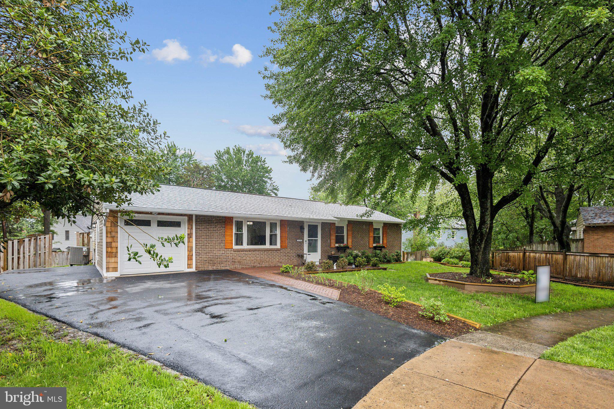 Welcome to 1250 Redwood, a beautifully updated 3-bedroom, 2-bath ranch-style rambler ideally located near Dulles Town Center, offering both privacy and convenience in a serene suburban setting.

The home has been FULLY UPDATED with LVP flooring, new bedrooms doors, fresh paint, siding and much more. 

Step inside to an open yet thoughtfully segmented floor plan, with LVP floor throughout, creating a warm and inviting ambiance. The main living space is bright and spacious, offering a natural flow between the living, dining, and kitchen areas—perfect for everyday living and effortless entertaining.

The eat-in kitchen features new cabinetry, new tile flooring, stainless steel appliances, granite counters and a picturesque window above the sink that brings in natural light and scenic views.

Retreat to the spacious primary suite, complete with dual closets and a fully renovated private en-suite. Enjoy high-end finishes including a frameless glass walk-in shower, elegant tile work, custom built-in shelving, silver fixtures, and a classic white vanity with granite countertops.

Two additional well-proportioned bedrooms offer generous closet space and flexibility for guest rooms, a home office, or additional family needs. The guest bathroom has been updated with new vanity, toilet, tile and sink. Step outside to your private backyard oasis—featuring a cozy deck with a charming new brick patio -  perfect for intimate outdoor gatherings or peaceful morning coffee.

Parking Details: Includes a 1-car front entry garage with additional driveway space accommodating two more vehicles comfortably.

See our attached Property Highlights Sheet for an extensive list of updates.