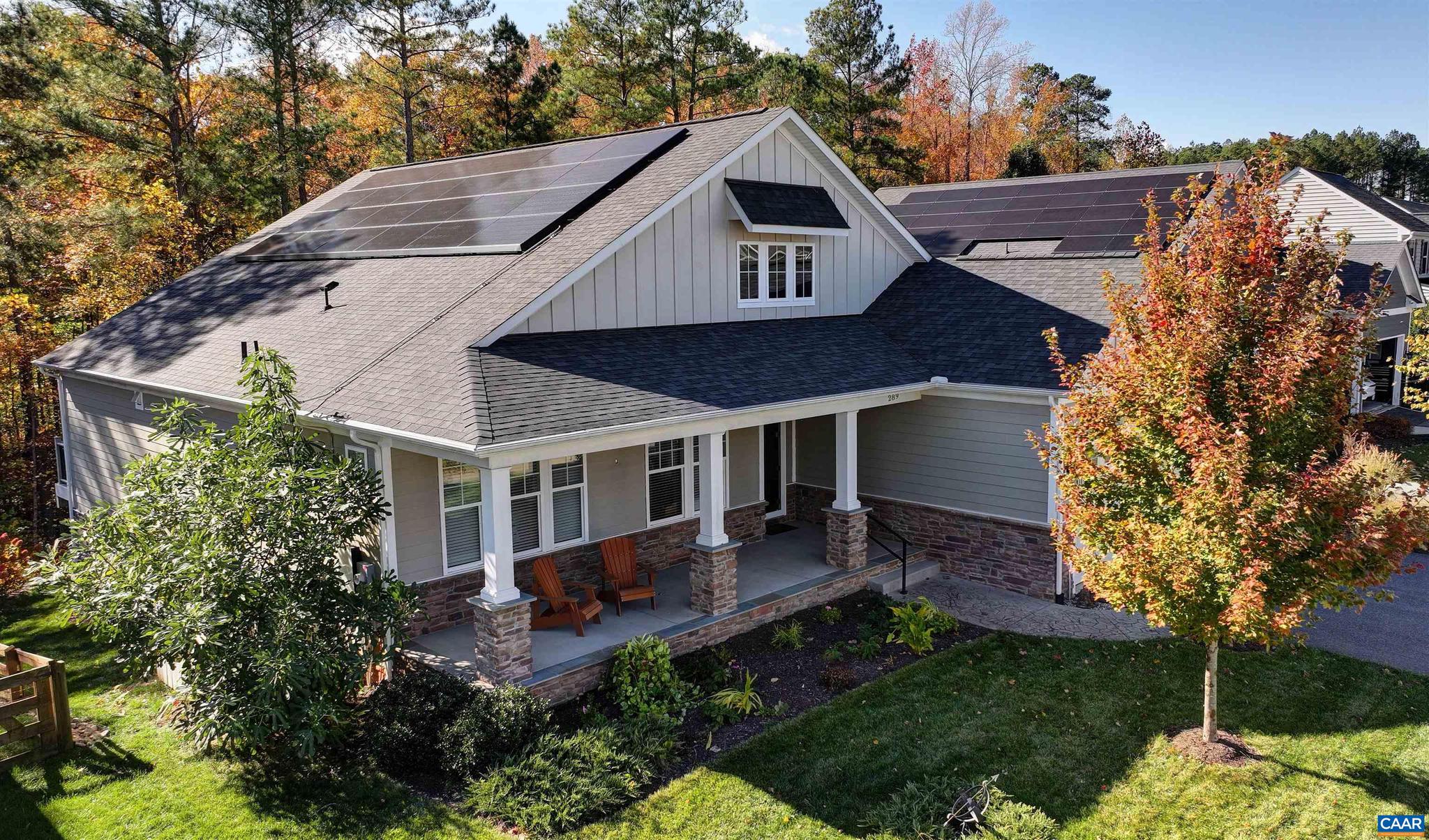 SPRING CREEK ? This beautifully upgraded home offers exceptional indoor and outdoor living with thoughtful enhancements and energy-efficient features. Enjoy peaceful views of the 12th golf hole from the private, professionally landscaped backyard featuring a Trex deck, patio, and sunroom with sliding doors and an automatic shade screen?perfect for year-round relaxation. A covered front porch welcomes you into easy first-floor living with an open great room, living and dining areas, and a gourmet kitchen. The main level includes the primary suite and two additional bedrooms, ideal for guests or a home office. The lower level features a spacious recreation room, bedroom, and full bath. Additional highlights include upgraded molding, expanded kitchen cabinetry and counter space, a terrace-level wet bar, solar panels, tankless water heater, whole-home water softener and filtration system, surround sound, epoxy-finished garage floor with utility sink, portable generator, and irrigation system. Located in Spring Creek with convenient access to Charlottesville and Richmond, plus community amenities including swimming, walking trails, tennis, and pickleball.
