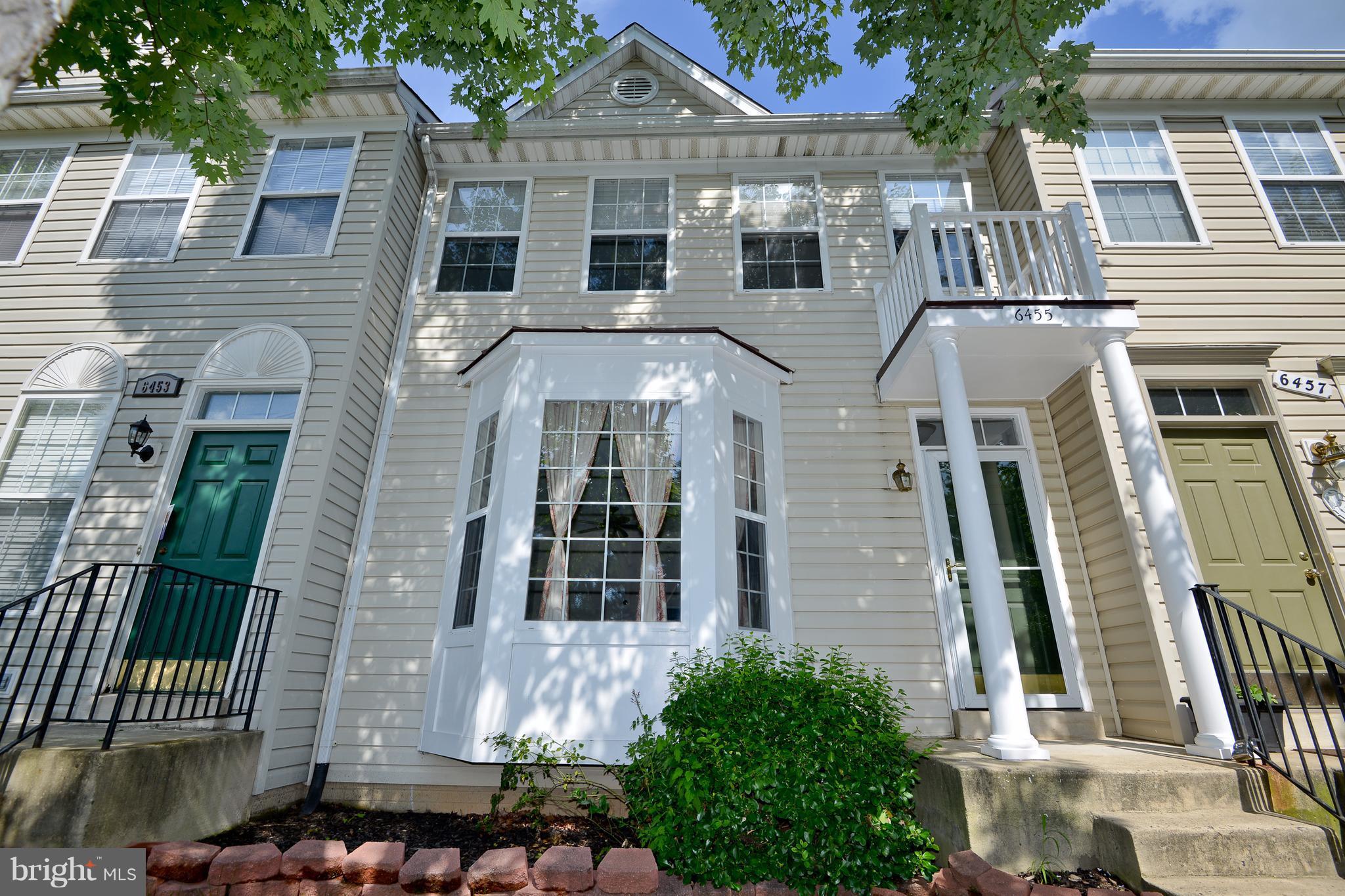 Spacious TH with new paint, move in ready. 9' ceilings, large eat-in kitchen with island, 42" cabinets, recessed lighting, entire main level HW, gas fireplace, MBR w/ full bath. Large basement with extra BDRM/DEN & full bath, walkout with brick patio, fenced backyard, 2 parking spaces, convenient location, walk to MetroBus, close to 66 and shopping, built in 1997, best value. Home Warranty.