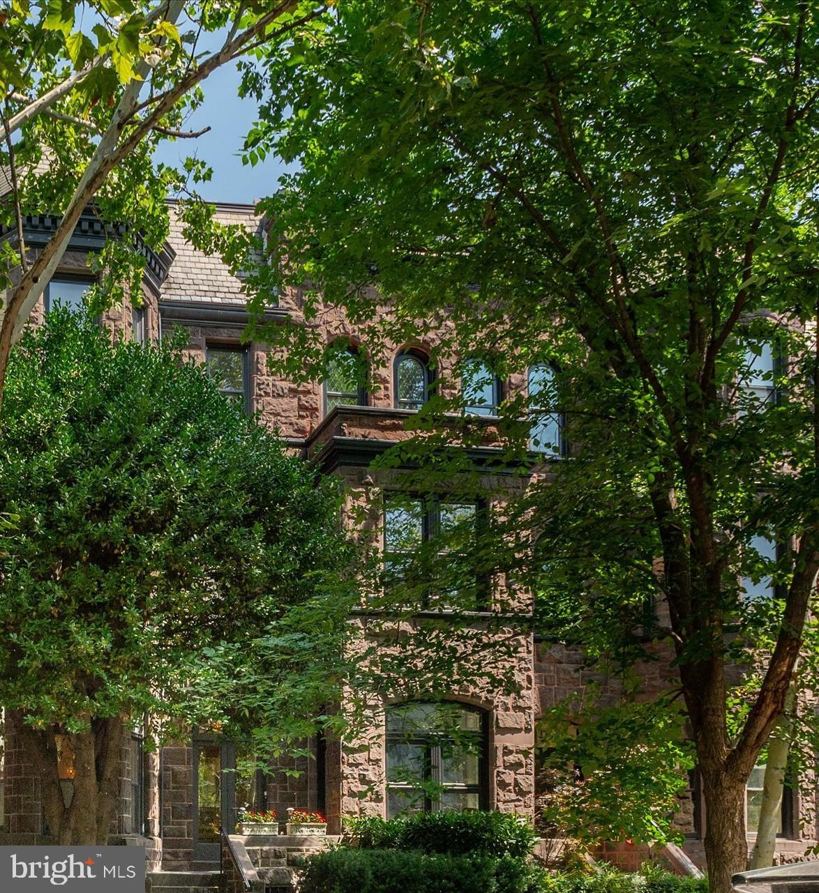 Rare opportunity on one of Dupont Circle’s most iconic blocks.  Designed in 1885 by renowned architect Thomas Franklin Schneider, this stately Victorian brownstone offers 4,000sf (per floor plan) across four levels in the heart of the Dupont Circle Historic District, just two blocks from Metro, restaurants, shops, and parks.

Historic charm meets modern comfort with hardwood floors, 9'+ ceilings, crown moldings, and four fireplaces (three functional) throughout.  The spacious eat-in chef’s kitchen features stainless steel appliances, granite countertops, a six-burner range, and opens to a private deck, patio, and coveted two-car parking.

The second level includes a generous primary suite with a sitting room, a large bath, and a laundry.  The third floor offers three additional bedrooms and a full bath.  The basement functions as a self-contained apartment with separate front and rear entrances, a kitchen, a bedroom, and a full bath.

Offering 6 bedrooms, 3.5 baths, and 2 kitchens, this flexible residence is ideal as a grand single-family home or owner-occupied investment property.  (The sixth bedroom is currently configured as a library.)