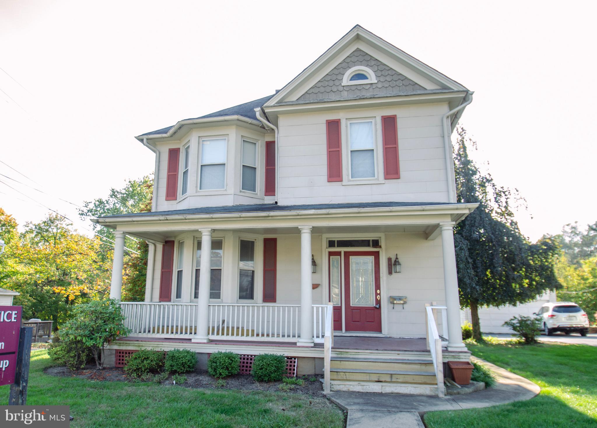 Currently used as offices, this 4BR Victorian in historic Reisterstown can EASILY support residential living with almost no manipulation!  Main level offers a generous Foyer/Receiving Area, Meeting Room (Living Room) w/ wb fireplace, a Den (open this wall up to create a HUGE Living Room), Formal Dining Room (Waiting Area), Kitchen and Full Bath.  Upper Level offers 4 BRs (Offices) and a Half Bath (tub has been removed - plumbing still INTACT to install tub/shower combination.)  Walk-up, fully floored attic presents ultimate storage space OR the opportunity for a future play/game room.  The sprawling lower lawn can easily host lacrosse/ soccer/volleyball/croquet games, a firepit - whatever you can imagine! Unbelievable parking spaces - 2 car detached garage + 2-car parking pad PLUS a lower parking lot that accommodates at least 5 vehicles. This property TRULY fulfills the needs of a small business AND/OR residential living - easily!