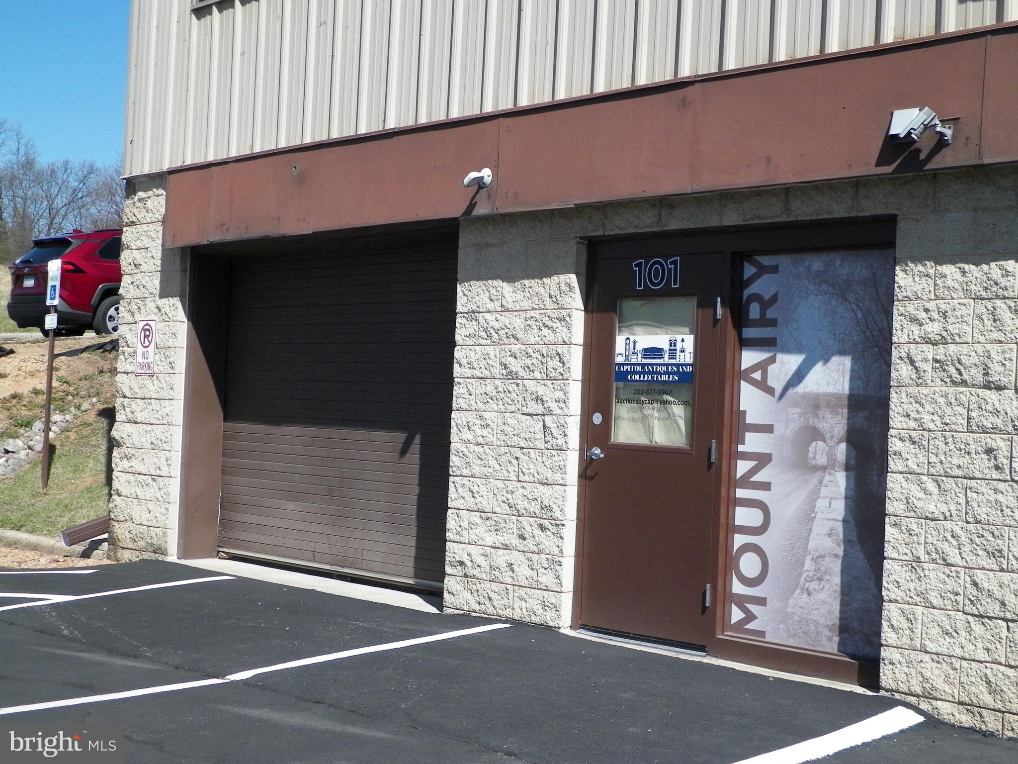Commercial space for sale on Center Street in Mount Airy MD.  Unit 1 is 1,214 sf and features a 10' x 8' Overhead  Door with Glassdoor Entry Way, Ceramic Tiling, Exposed Ceiling Venting, Open Space with a Modern Bathroom.  Currently tenant occupied as office/warehouse space.  Property is conveniently located within the Town of Mount Airy with easy commuter access Routes 27 & 26 and I-70.  Unit is available for owner occupants or investors.