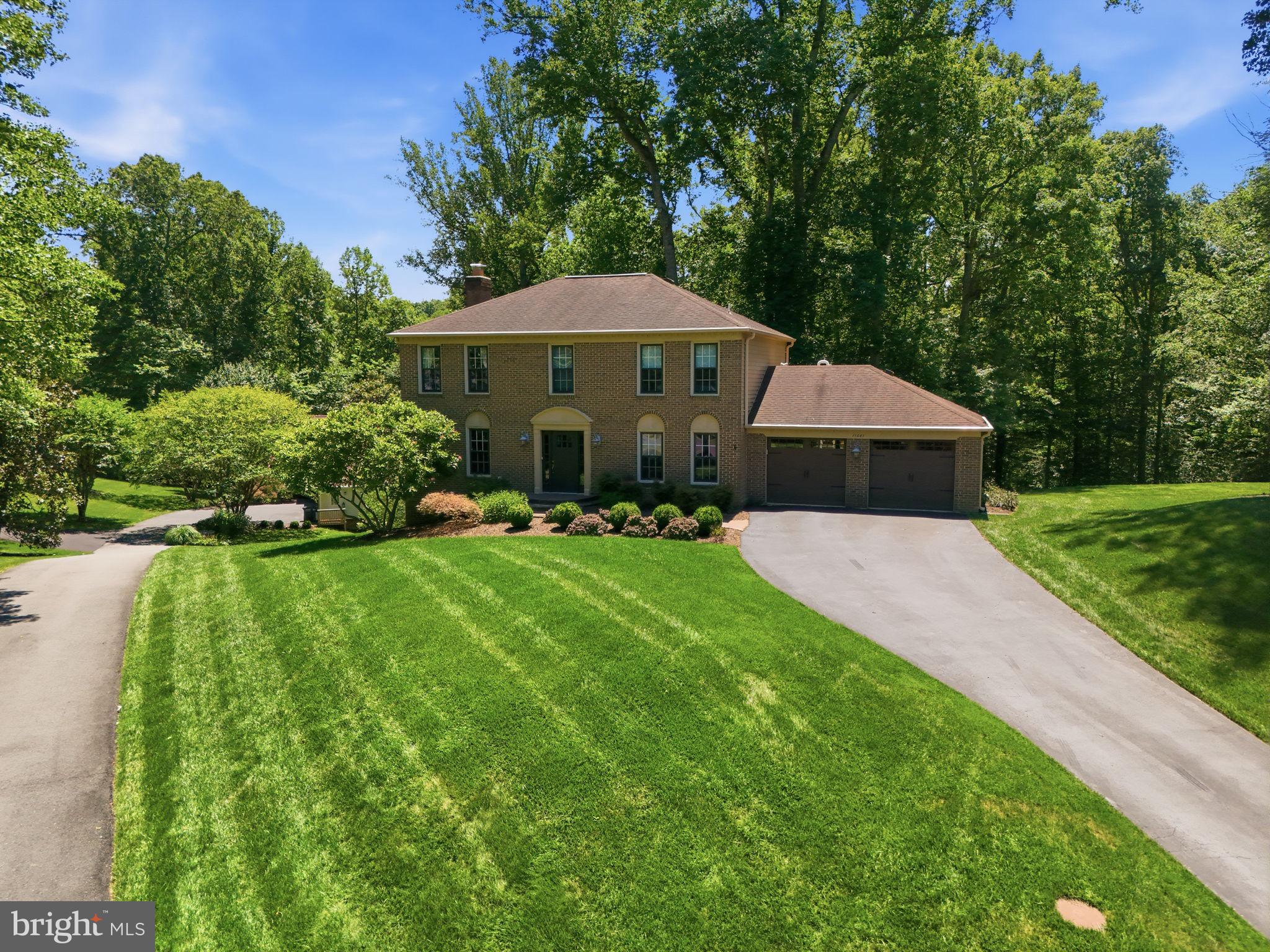 Assumable VA loan with 2.12% interest rate (for eligible Veterans)! Welcome to your private retreat in the heart of Fairfax Station. Nestled on a picturesque 0.62-acre lot surrounded by mature trees, this beautifully maintained 4-bedroom, 3.5-bath brick Colonial offers the perfect blend of timeless elegance, comfortable living, and peaceful outdoor spaces.

Step inside to discover gleaming hardwood floors throughout the main level, a spacious formal living room and dining room, and a warm, inviting family room featuring a gas fireplace that flows seamlessly into the kitchen with a generous breakfast area. Just beyond, the sunroom opens to a spacious deck overlooking the tranquil backyard—an ideal setting for morning coffee, entertaining, or simply enjoying the natural surroundings.

Upstairs, the expansive primary suite serves as a relaxing retreat with a luxurious ensuite bath featuring a soaking tub, separate shower, and beautiful wooded views. Three additional bedrooms and a full hall bath provide plenty of space for family and guests.

The fully finished walk-out lower level offers exceptional versatility with a private office, full bath, custom built-in shelving, a wet bar, a cedar closet, and an expansive recreation area. New Pella French doors lead to a charming brick patio, creating another inviting space to unwind while taking in the peaceful backyard views. Beyond the trees, the yard also offers a level open area perfect for play, gardening, or outdoor activities. The secret to the beautiful lawn is a 5 zoned irrigation system. 

Located in the highly desirable Fairfax Station community, this home combines privacy with outstanding convenience. Enjoy easy access to the Fairfax County Parkway, Route 123 (Ox Road), Burke Centre VRE Station, and a commuter bus stop at the neighborhood entrance. Served by Oak View Elementary and Robinson Secondary School, this exceptional property offers the perfect balance of serene living and everyday accessibility.

Nearby Fairfax Station Swim & Tennis Club offers an optional membership open to all residents featuring a pool and lighted tennis courts. The club also hosts numerous adult and family-oriented social events, including happy hours and ice cream sundae nights.

This is more than a home—it's a peaceful sanctuary you'll love coming home to every day.

Interior photos will be added today!