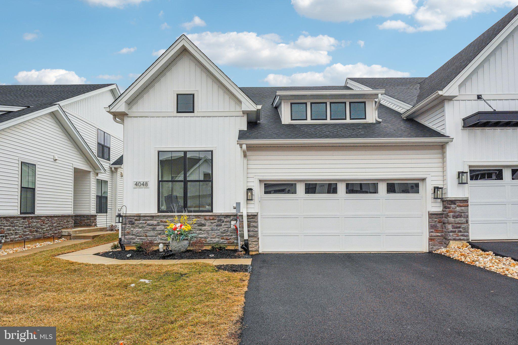 Welcome to 4048 Fritz Place - a charming three-bedroom, three-bathroom home in highly sought-after Regency of South Whitehall, an active over-55 community. This beautifully designed home offers convenient and easy access to major routes like 309, 78, and Route 100, and 222 and the entire Lehigh Valley too!! From the moment you step inside, you'll be delighted by the spacious, open-concept layout. The upgraded gourmet kitchen, dining area, and great room flow seamlessly together, with a gas fireplace creating a warm and inviting atmosphere. Enjoy outdoor living with an expanded patio perfect for relaxing or entertaining. The spacious en suite master bedroom boasts an oversized walk-in closet . An additional bedroom/office and full bath along with a mud room/laundry room complete the first floor. Upstairs, the loft space offers the third bedroom while the additional finished space offers endless possibilities—transform it into a craft room/office/extra storage. A full bathroom rounds out the second floor. The lower level offers over 900 square feet of bright, open finished space ready for you to make it your own. Plus there's an extra room for creative possibilities. Enjoy relaxing on the patio while taking in stunning sunset views. The thoughtful design throughout the home reflects the attention to detail the seller put into creating this home with room for expansion and your own personal touches throughout. Don't miss this wonderful opportunity!