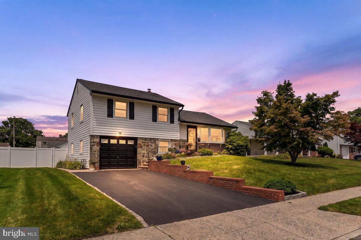 Picture Perfect Split Level Home in the Highly Desirable Lawrence Park Neighborhood of Broomall ! This Stone and Brick Front Beauty has been lovingly maintained with many recent updates both cosmetically and the major infrastructure systems. Some of the Bonus Features include a Rear Sun Porch overlooking the Large and Level Fenced in Back Yard, a Two Year Old rear Storage Shed, Updated Roof and Siding, New Central Air (2025), Newer Gas Hot Water Heater (2024), and Updated Anderson Vinyl Windows. The Gorgeous Newer Kitchen (2021) Features White Cabinets, Gas Range, Quartz Counters, Newer Dishwasher, and Ceramic Backsplash. The Hall Bathroom has also been updated, and the Bedrooms are spacious. Most of the interior features hardwood flooring, and the lower level family room features luxury vinyl plank flooring. The built in garage features a garage door opener with a new motor, and the private driveway can accommodate two more vehicles. This fabulous home also has such handsome curb appeal. The location is convenient to everything Marple Township has to offer including Shopping, Restaurants, Parks and Schools, Major Traveling Routes, and walking distance to the Lawrence Park Shopping Center. Welcome Home to Many Years of Happy Memories !