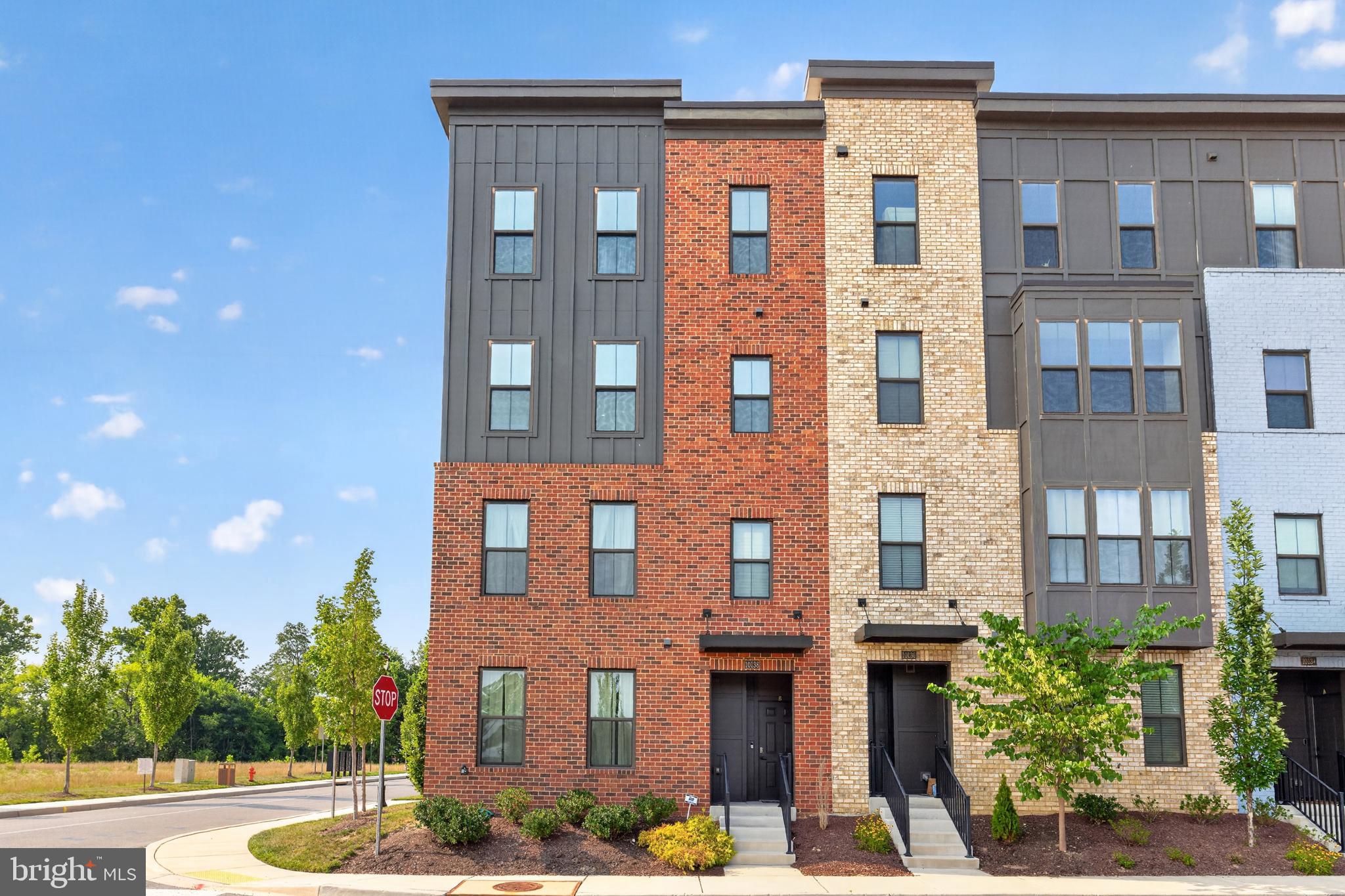 There is never a wrong time to buy the right home! Welcome to this beautifully appointed 3-bedroom, 2.5-bath condo in the highly sought-after Paddock Pointe community. Offering over 2,300 square feet of thoughtfully designed living space, this stylish two-story home combines modern comfort with elegant finishes.

The open-concept floor plan is perfect for both everyday living and entertaining. The Chef's Kitchen seamlessly flows into the spacious dining area and Great Room, creating the ideal gathering space for family and friends. A convenient pocket office off the dining room provides the perfect work-from-home setup.

Upstairs, retreat to the luxurious owner's suite featuring a spa-inspired bath with dual vanities and a generous walk-in closet. Two additional bedrooms, a full hall bath, and an upper-level laundry room complete the second floor.

Step outside to the Sky Lanai, a signature covered outdoor living space that has been thoughtfully upgraded into a true outdoor retreat. Enjoy the newly added fireplace, elegant brick accent walls, a retractable black privacy screen, and a fully furnished seating area complete with comfortable outdoor couches and a table, creating the perfect setting for relaxing or entertaining throughout every season.

Additional features include an attached garage and access to exceptional community amenities. Just beyond your front door, enjoy 22 acres of open green space, scenic walking trails, a dog park, and a community garden. Conveniently located within walking distance of the Maryland Jockey Club at Laurel Park and the MARC Train Station, with easy access to major commuter routes, shopping, dining, and entertainment.

This is more than a home...it's a lifestyle. Schedule your private showing today and experience everything Paddock Pointe has to offer.