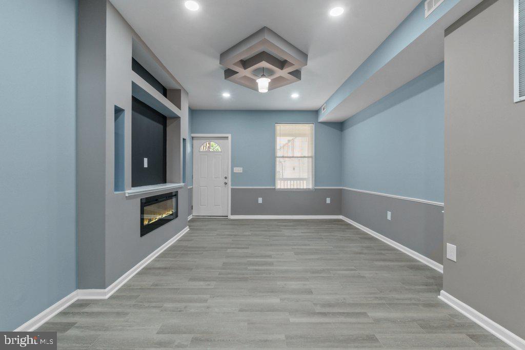 Nestled in the heart of the prestigious Central Park Heights neighborhood, this exquisite interior row townhouse, built in 1920, seamlessly blends traditional charm with modern comforts. Step inside to discover a fully finished basement that provides ample space for entertainment, relaxation, or a personal gym-perfect for unwinding after a long day. The inviting ambiance is enhanced by a cozy fireplace, creating a warm focal point in the living area, ideal for intimate gatherings or quiet evenings at home. The property boasts a private, fenced parking area, ensuring convenience and security for you and your guests. Enjoy the peace of mind that comes with having your own dedicated space in a bustling urban environment. The charm of the neighborhood is complemented by its proximity to cultural attractions including nearby parks, shops, and dining options that Central Park Heights has to offer, making it an ideal location for those who appreciate the finer things in life. With no association fees to worry about, you can enjoy the freedom of homeownership without the added cost. Don't miss the chance to make this enchanting townhouse your own and start living the life you've always dreamed of beginning.