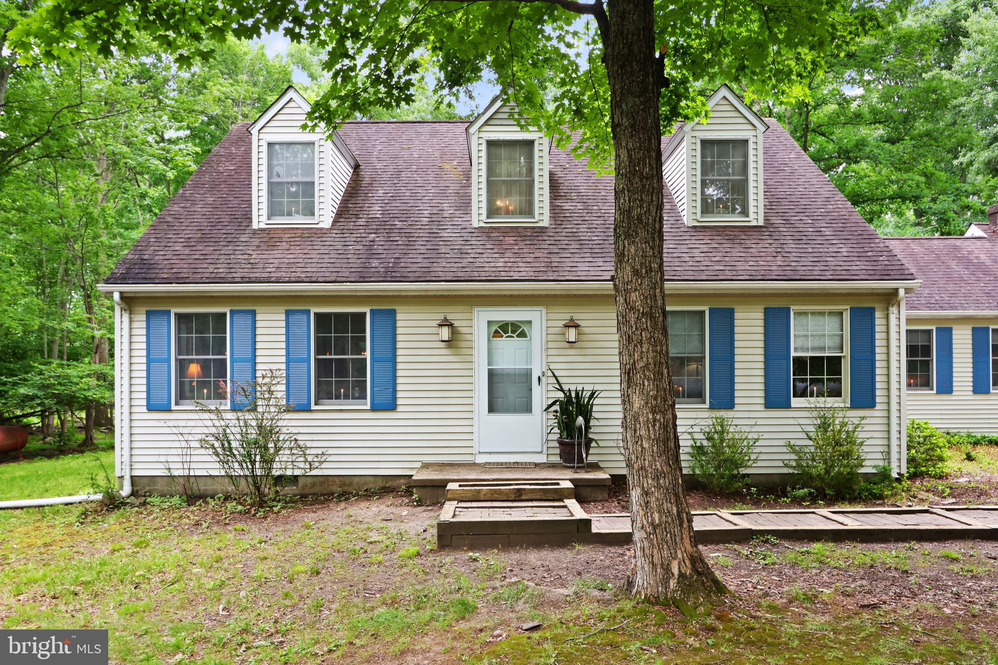 If you’ve been searching for that perfect mix of space, comfort, and a relaxed lifestyle, this East Stroudsburg Cape Cod is calling your name. Tucked away on a generous **1.04-acre lot**, this home gives you all the room you need to breathe, play, and just kick back.Clocking in at a spacious **2,664 square feet**, this 4-bedroom, 3-bathroom home has a layout that just makes sense:First Floor Living: Step inside to gorgeous, easy-to-maintain **hardwood floors** spanning the main level.Main-Level Ensuite: Skip the stairs! The first floor features a comfortable bedroom complete with its own private ensuite bathroom—perfect for guests, in-laws, or your own peaceful retreat.Room for Everyone: With 4 total bedrooms and 3 full baths, morning rush hour is officially canceled. The real magic happens when you step outside. There is more than enough flat, open space to plant a massive vegetable garden, throw down a fire pit, or finally build that **in-ground pool** you’ve been wanting. Parking & Projects The attached **2-car garage** means no scraping snow off your windshield in the winter, plus plenty of extra room for a workbench or hobbies.Located in a peaceful neighborhood pocket of East Stroudsburg, you get the quiet country feel of living on an acre without sacrificing convenience. It’s the kind of place where you can spend your mornings sipping coffee on the deck and your weekends hosting effortless backyard barbecues.Ready to see what easy living feels like? Come check it out before someone else calls it home! Ask how to receive up to $5,000 lender credit towards closing costs or lowering your interest rate!