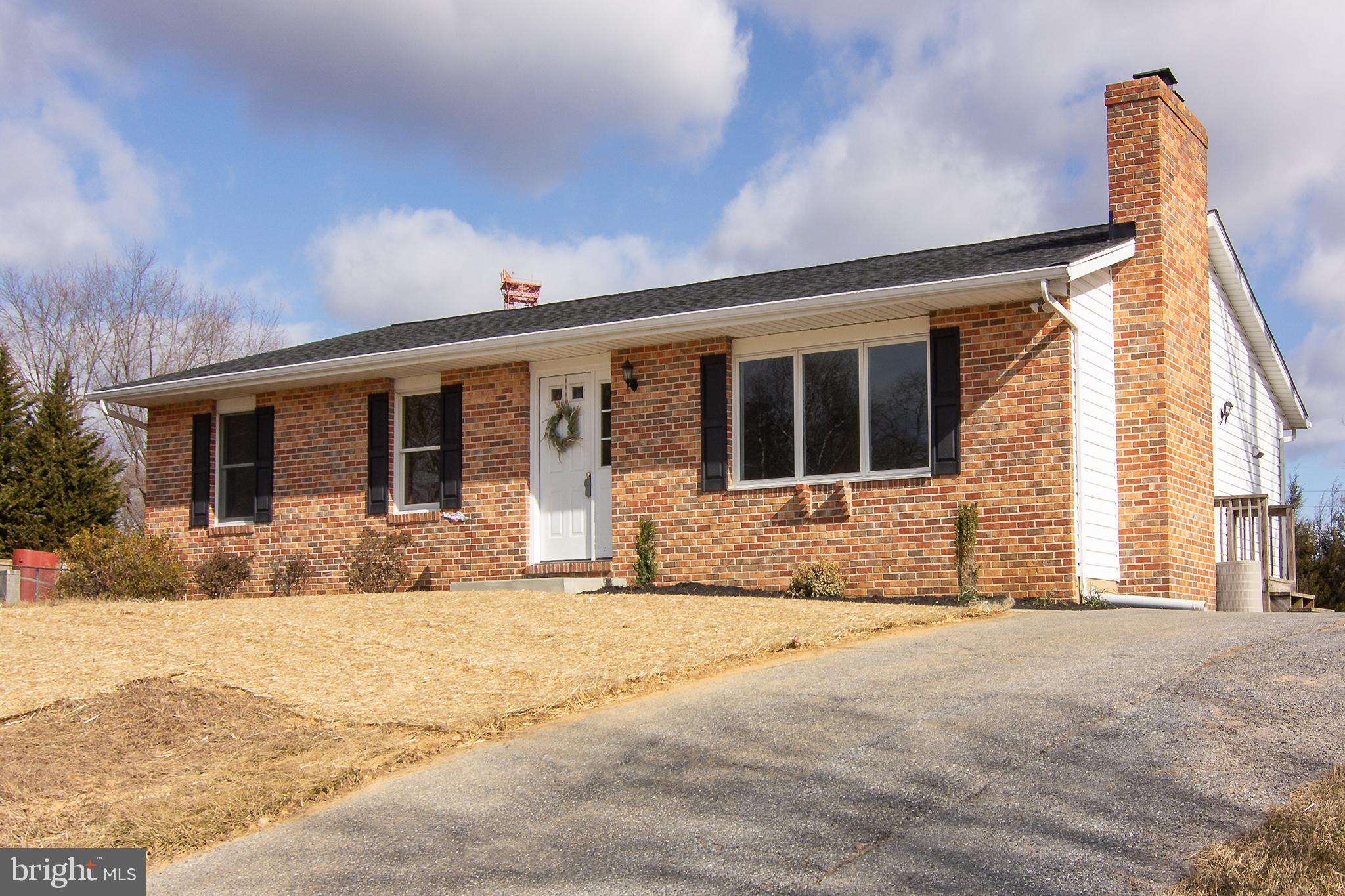 Large, over 1500 Sq Feet on the main level.  This rancher has been freshly painted and has new carpet.   Amenities include a wood burning fireplace in the spacious Living Room.   The Dining Room has a sliding glass door to the trex deck.   Eat in Kitchen with lots of counter space.  Three large bedrooms and 2 full baths complete the main level.   The lower level family room is extremely large with ceramic  flooring.  It's a great space for the family and friends to gather.    Located on a quiet road but within minutes to Rt 795   Nice level back yard and large parking area.