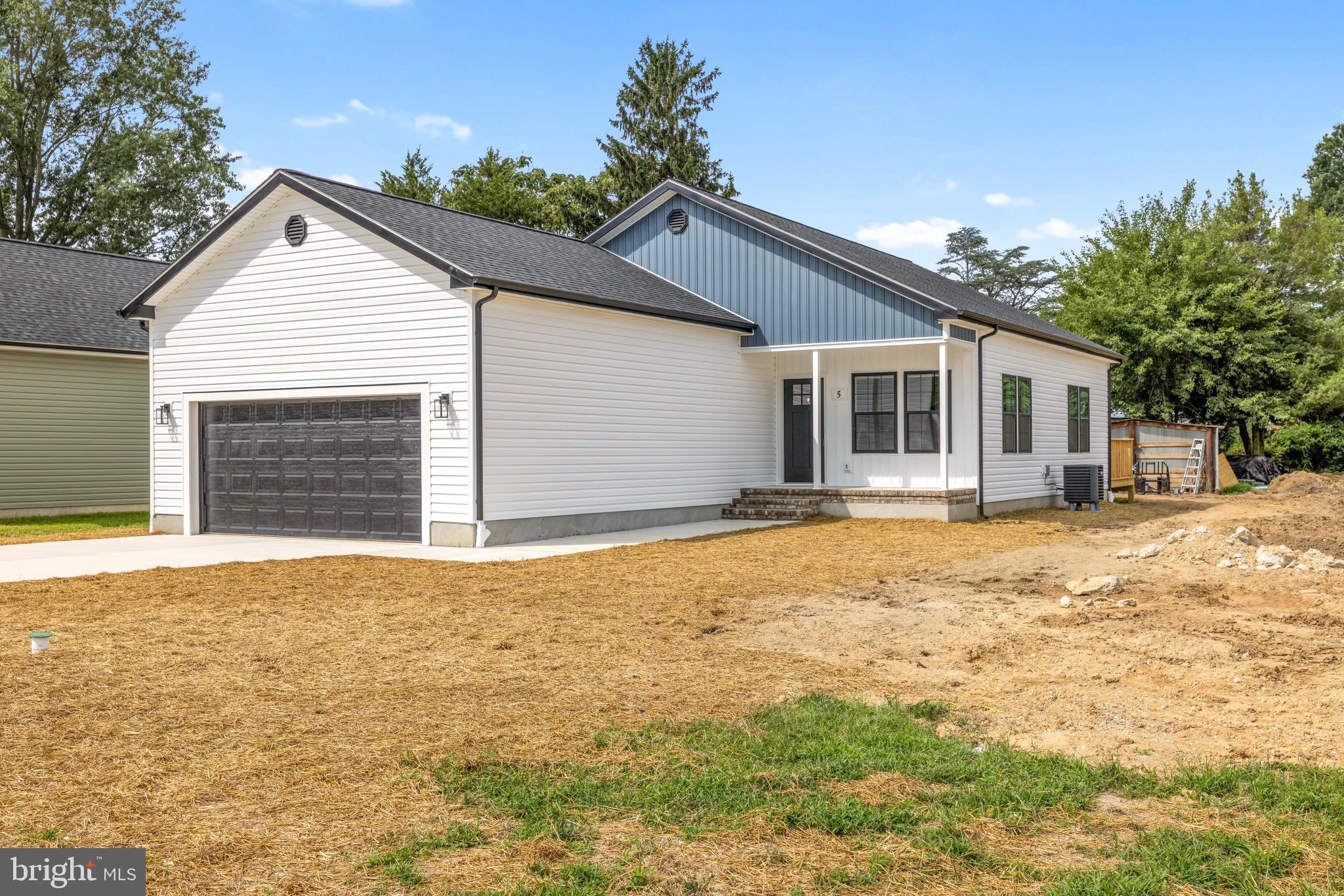 OPEN HOUSE | Sunday, July 19 | 12:00–2:00 PM

Welcome to 5 Sunrise Avenue, a beautifully crafted Lomaxx Custom Homes rancher that’s complete and move in ready! This thoughtfully designed home offers 4 bedrooms, 2 bathrooms, and a spacious 2-car garage, blending modern style with everyday comfort.

Inside, you’ll find an open layout featuring luxury vinyl plank flooring, quartz countertops, stainless steel appliances, tile showers, and quality finishes throughout. Step outside to the rear deck and enjoy the peaceful surroundings of Ridgely’s charming small town setting.

Built for low maintenance living with a concrete driveway, encapsulated crawl space, and quality craftsmanship, this home is also just a short walk from Martin Sutton Memorial Park, offering walking trails, tennis courts, playgrounds, and more.

Schedule your private tour today or stop by the Open House this Sunday!