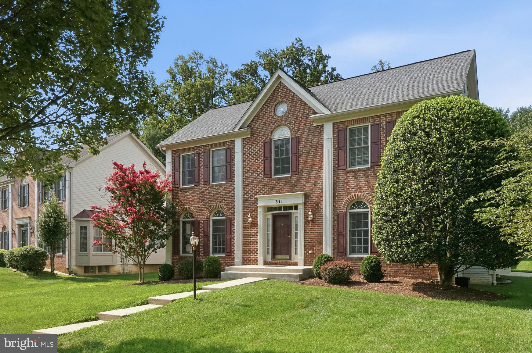 Welcome home to this beautifully maintained 4 bedroom, 3.5 bath colonial on a corner lot in the sought after Nottingham Woods community. Step inside to a welcoming foyer with 9ft ceilings that sets the tone for the thoughtfully designed main level. A light filled formal dining room and living room offer wonderful spaces for entertaining, while a dedicated main level office provides the perfect spot to work from home. Toward the back of the home, the open floor plan connects the kitchen to the family room with newly installed hardwood floors (2025), anchored by a fireplace with custom built in surround shelving. The eat-in kitchen features granite countertops, a gas cooktop, and a double oven (2022). Main level laundry and a mudroom off the 2 car garage round out the everyday convenience, along with a half bath refreshed with a new toilet and plumbing fixtures (2025). Upstairs, the updated owner's primary suite is a true retreat, featuring an updated bath and a massive walk in closet with custom closet systems (2023). Three additional bedrooms and a full bath complete the upper level. The finished lower level offers plenty of living space, with a full bathroom, abundant storage, and a bonus room ideal for a playroom, home gym, or potential 5th bedroom. The fully fenced backyard boasts a deck and playset, both freshly painted in 2025. This home has been thoughtfully updated throughout, including dual AC systems (2022), roof (2019), attic fan (2022), Liftmaster garage door opener (2023), and washer and dryer (2018). Enjoy sidewalk lined streets with access to the Robin Hood Swim Club and easy proximity to Route 200, I-495, shopping, dining, and parks. This one truly has it all.