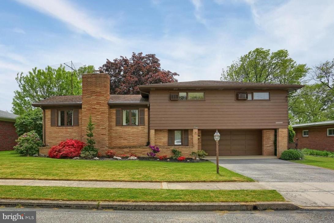 Simple mid-century modern lines and aesthetic appeal are all ready to welcome you home! Located within walking distant of Hanover's parks, shopping, restaurants and the YMCA, this 4 bedroom split level boasts wooden cathedral ceilings, dining room, sunroom and spacious lower level family room. Features include wood floors, knotty pine paneling, 2 fireplaces and a cedar coat closet. Clever touches of vintage charm have been added with a beautiful antique fireplace mantel and 1800's beveled glass door. A full one year home warranty is included! Don't miss out; schedule your showing today!