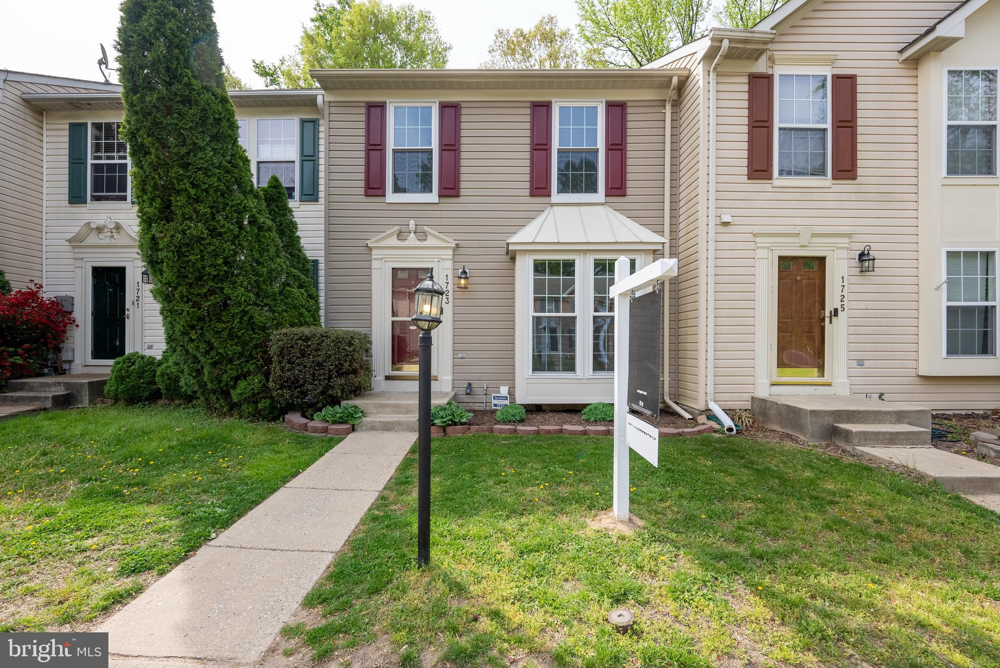 Welcome to 1723 Barnwood Court, a beautifully maintained townhome located in Carriage Pines. This home offers three levels of comfortable living space.  The main level has a mostly open-concept layout ideal for entertaining and daily living, with a bright living room, large eat in kitchen with plenty of counter space and a bonus sun/lounge room in the back that opens to the deck.  A convenient powder room is also located on this level. Upstairs you will find a primary suite, two additional bedrooms and another full bathroom. The basement is fully finished and includes an additional large living space and full bath, ideal for a guests, home office, or recreational space.  BONUS - two big-ticket items have already been taken care of: (1)  brand new architectural ROOF was installed February 2025 and HVAC in 2020!!  This location is ideal for many as it is close to Ft. Meade/NSA, commuter rails and highways, easy commute to Baltimore, DC or Annapolis and all this area provides!  And all for $400,000!!  Hurray!