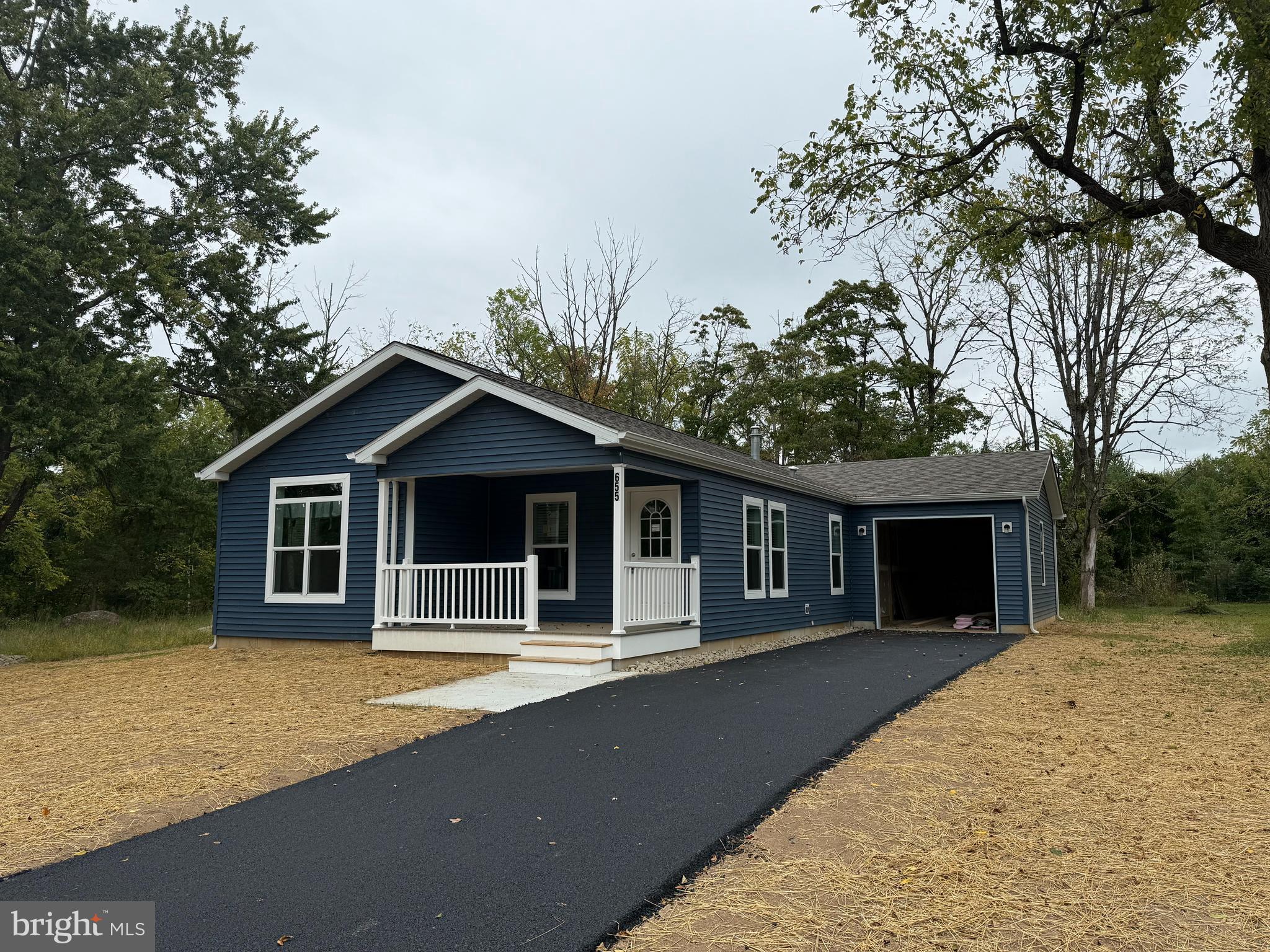 New three bedroom two bath home with an attached one car garage. Morden living all on. one floor. This home features traditional style with a custom kitchen. The location is amazing. Large private lot.
