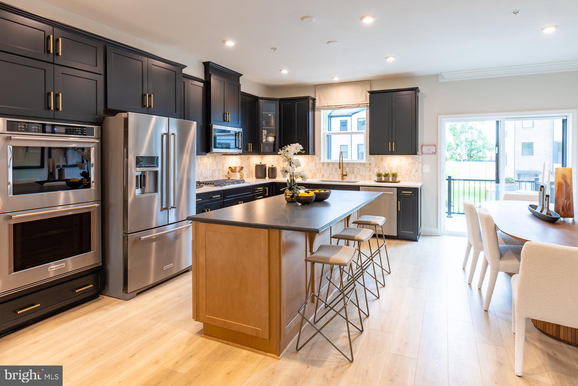 The Chesapeake model offers spacious and flexible living across three stories, with an optional fourth-story loft and deck for even more room to grow and entertain. This thoughtfully designed townhome features 3 to 4 bedrooms, including a bright and open primary suite on the bedroom level, complete with a conveniently located laundry area. Two generously sized secondary bedrooms provide space for family and guests. The rear two-car garage opens to a recreation room or 4th bedroom. On the main living level, you'll find an impressive open-concept kitchen that seamlessly connects the great room and dining area—ideal for everyday living and effortless entertaining. As a homeowner, enjoy community amenities,   including the dog park, community playground, pickleball and tennis court, and community gardens. Plus, enjoy access to Sparrows Point Country Club, which includes a marina, boat ramp, newly renovated clubhouse with restaurant & bar, an 18-hole championship-style course on Bear Creek, and the 2nd largest pool in Baltimore County. See your brand-new home today. Enjoy energy savings with our ENERGY STAR® certified and Indoor airPLUS-qualified homes. *Photos are of the Model home. *This listing reflects the base price for a to-be-built home on a lot in the community. *Pricing, features, and availability subject to change without notice.