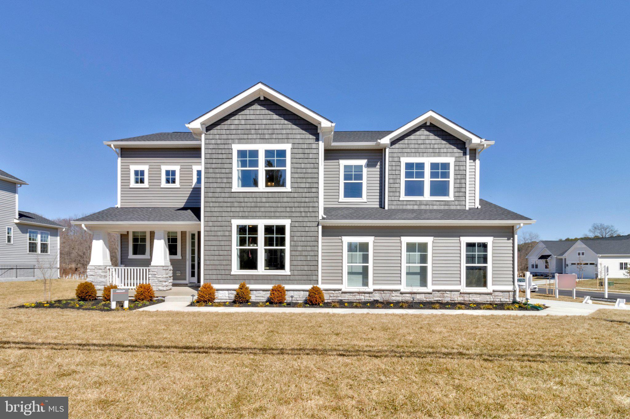 The long-awaited Presley model at Worthington Grove by Richmond American Homes will be ready to call be called home in June!  An attractive covered porch and airy two-story entry welcome you into this model home. The main floor boasts an open great room and a gourmet kitchen, complete with stainless-steel appliances, an island and a walk-in pantry. Entertain in style with a generous sunroom and a spacious covered patio. You’ll also appreciate a private study with French doors, a convenient powder room and a mudroom with a bench. Upstairs features three secondary bedrooms with 8' doors, two baths and a large laundry room. Unwind in the lavish owner’s suite, which contains a deluxe bath with a dual sink as well as an expansive walk-in closet. Enjoy a finished basement with an additional bedroom and bath, a flex room, a media room and an inviting rec room. A side entry 2-car garage with a shop completes the must-see residence. Come make this model your home today!