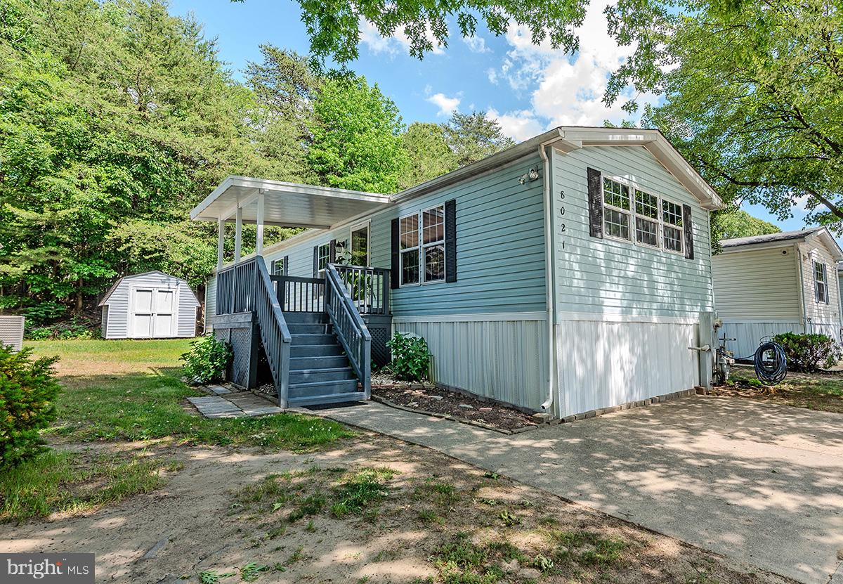 Affordable living with style and comfort! This well-maintained 2-bedroom, 2-bath single-wide home offers a spacious layout and great outdoor living in a community with sidewalks and a welcoming neighborhood feel. Enjoy your morning coffee or unwind in the evening on the covered deck with awning—a perfect spot to relax outdoors. Inside, you’ll love the cathedral ceilings and open feel, along with a large eat-in kitchen featuring luxury vinyl plank flooring, abundant cabinetry, and a built-in hutch for extra storage and charm. The primary suite offers a spacious walk-in closet and a private garden bath complete with soaking tub, separate shower, and dual sinks. A second bedroom and full bath provide flexibility for guests, office space, or hobbies. Laundry is conveniently located in the home, and there are two private driveway parking spaces plus your own mailbox.📍 Located in Severn Mobile Home Park, convenient to shopping, dining, and major commuter routes. Important Details: Park approval required. $50 application fee per applicant. Minimum credit score of 630. Ground rent is $1,015/month. At lease signing, first month’s rent and security deposit (equal to one month’s rent) are required.