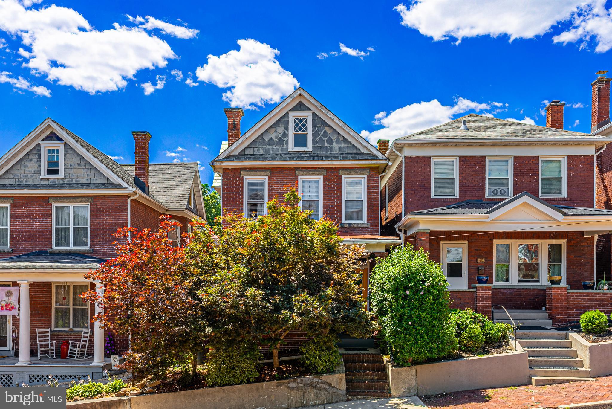 Historic Charm Meets Modern Comfort in Mountain Side Maryland!
Experience the best of both worlds in this beautifully updated home, where historic Cumberland character blends seamlessly with today's modern conveniences. Stunning 3-4 Bedrooms, 2 full bath brick home, The stylish kitchen features heated tile floors, while the beautifully renovated bathrooms and tasteful décor create a warm, inviting atmosphere throughout.  Take in the million-dollar mountain views from the comfort of your home or unwind on the shaded front porch with your favorite drink and enjoy the porch swing. The spacious outdoor entertaining area and rear porch are perfect for summer cookouts, gatherings with family and friends, or simply relaxing outdoors.  The walk-up attic offers endless possibilities—create a home office, artist's studio, hobby space, or additional living area to fit your lifestyle. A detached garage provides plenty of room for parking, storage, or a workshop.  Ideally located within walking distance of downtown Cumberland, scenic trails, shops, restaurants, and local attractions, you'll love the convenience of exploring the area on foot or by bike.  If you've been searching for timeless character, thoughtful updates, spectacular views, and an unbeatable location, this is the home you've been waiting for. Schedule your tour today!