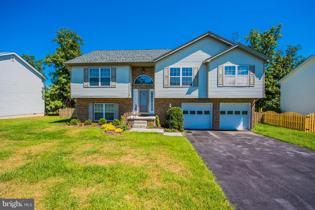 You will enjoy the spaciousness of this traditional home. Cozy up to the fireplace in the family room this fall as the weather cools. The large level fenced back yard is ideal for a swimming pool, gardening, or perhaps a playset. Close to all the amenities this small town has to offer and only a few minutes to major commute routes. Home warranty is offered for your after purchase piece of mind.