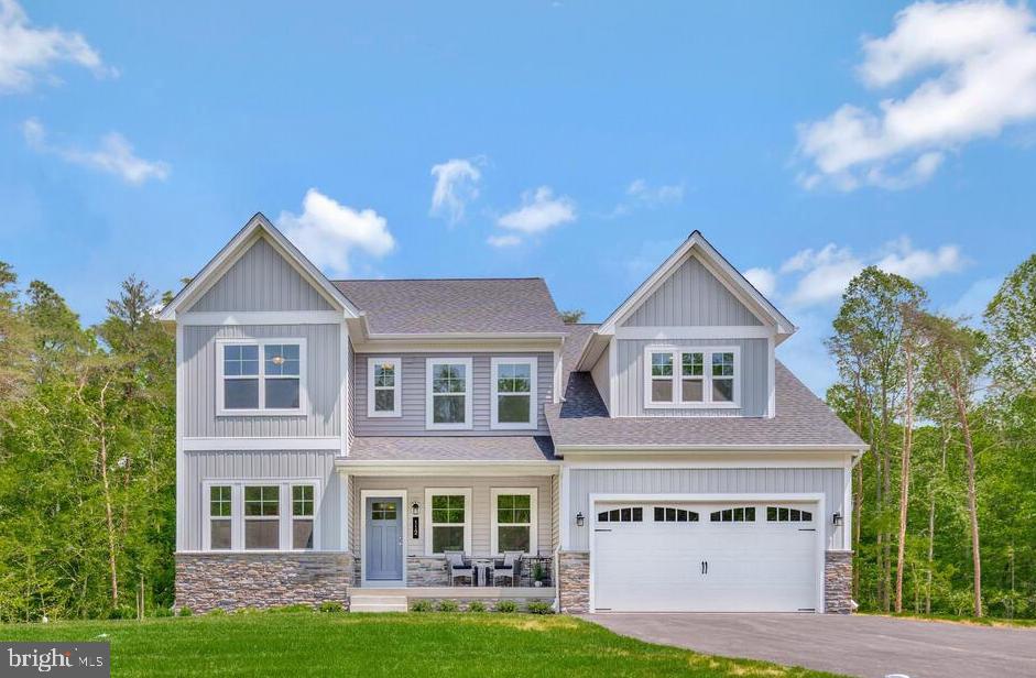THIS IS A TO BE BUILT HOME  Step into the beautifully crafted Adam's floor plan—where modern comfort meets thoughtful design for everyday living and effortless entertaining. The open-concept layout seamlessly connects the kitchen, dining area, and great room, creating a natural flow that suits today’s lifestyle.
At the heart of the home, the kitchen shines with a spacious center island perfect for casual seating and conversation. A walk-in pantry, elegant 42" cabinetry, and stylish brushed-nickel finishes offer the perfect blend of function and timeless appeal. Nine-foot ceilings and recessed lighting throughout enhance the bright, airy feel, while the main living spaces flow effortlessly together—ideal for both lively gatherings and relaxed evenings at home.
Unwind in the serene primary suite, designed as a true retreat. Enjoy the luxury of a soaking tub—perfect for recharging at the end of the day—along with a thoughtfully designed layout that offers both comfort and privacy.
The unfinished basement with rough-in plumbing provides endless possibilities to make the space your own. Whether you envision a home gym, media room, game space, or private guest retreat, this flexible area is ready to grow with your needs.
The Adams floor plan is designed to adapt to the way you live—beautifully, comfortably, and effortlessly.