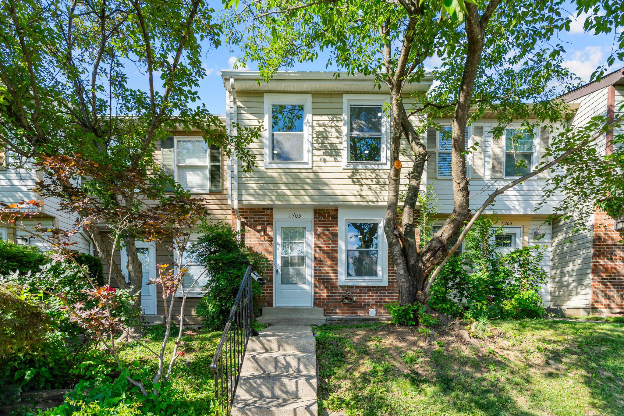 Beautifully renovated brick-front Colonial townhouse in sought-after Middlebrook Commons! This move-in ready home offers 3 bedrooms, 2.5 baths, and a fully finished basement, providing flexible living space for a recreation room, home office, gym, or guest area. The updated interior combines modern finishes with comfortable everyday living, while the cozy fireplace creates the perfect gathering space. Step outside to a private deck, ideal for entertaining, grilling, or relaxing with your morning coffee. Low HOA fees include trash removal, making maintenance easy. Conveniently located near shopping, restaurants, parks, and major commuter routes, this home offers the perfect combination of comfort, style, and convenience. Don't miss this exceptional opportunity!