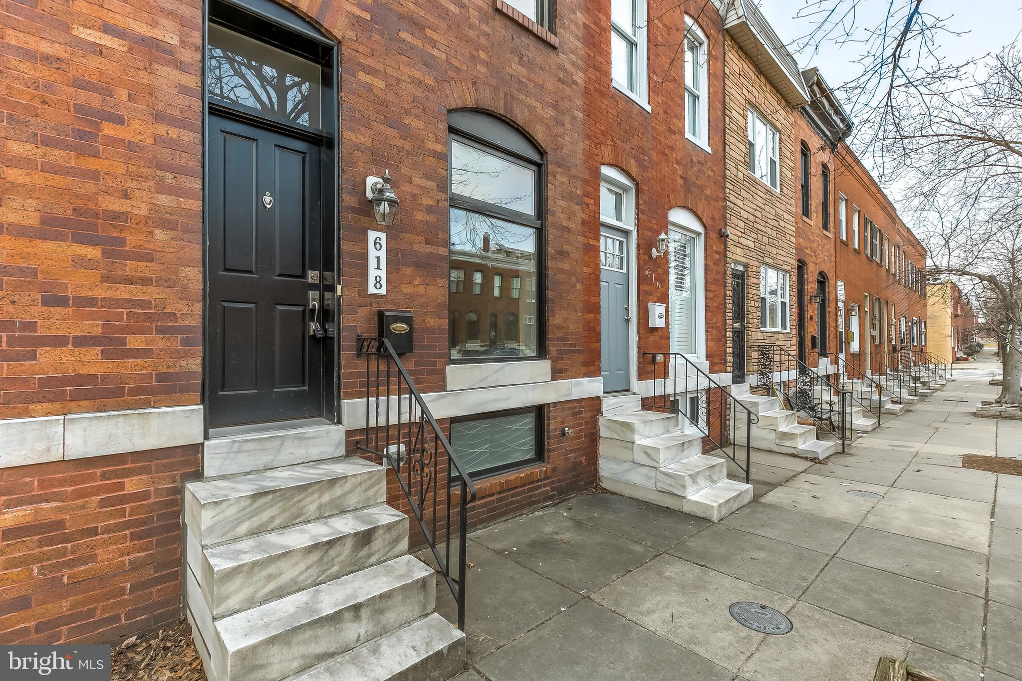 CHAP! PARKING! TOP LOCATION IN CANTON! METICULOUSLY MAINTAINED ROWHOME WITH MODERN UPDATES AND AMENITIES. TOP OF THE LINE ENGINEERED HICKORY HARDWOOD FLOORS. INCREDIBLE KITCHEN WITH MARBLE COUNTERS, LARGE ISLAND, SMOKED GLASS SUBWAY BACKSPLASH AND HIGH END APPLIANCES. EASY ACCESS TO COVERED PARKING IN REAR. 2 YEARS REMAINING ON CHAP TAX!