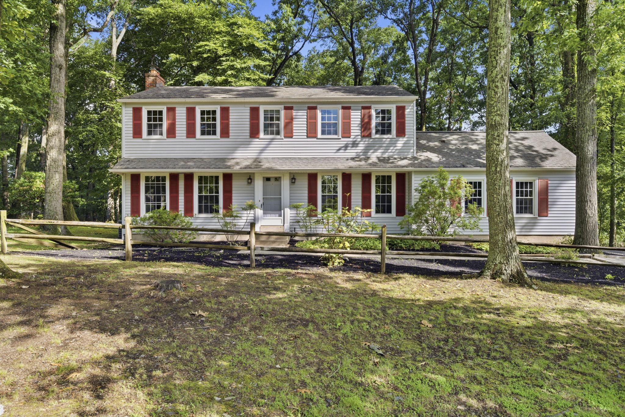 Nestled on a quiet cul-de-sac in sought-after Tredyffrin Township, this classic Center Hall Colonial sits on a .9-acre lot and the kind of property that simply doesn’t surface here often. Top-rated schools, mature privacy, and nearly an acre of land in this neighborhood? It’s a combination buyers wait years to find. Inside, hardwood floors run throughout, anchoring a layout that just works. A formal living room and elegant dining room greet you at the front of the home, while the back family room off the kitchen is where real life settles in, comfortable, connected, and perfectly positioned to flow out to the screened-in covered porch and deck overlooking a truly private backyard. That outdoor space alone is worth the visit. Upstairs, four generously sized bedrooms include a master suite and a wonderful wraparound hallway that leads to the fourth bedroom, a layout with both character and function. The attached two car garage and long driveway offer parking in abundance, a detail that feels small until you don’t have it. Add in the mature landscaping, the cul-de-sac setting, and schools that consistently draw buyers to this zip code and you have something that rarely comes together quite like this.