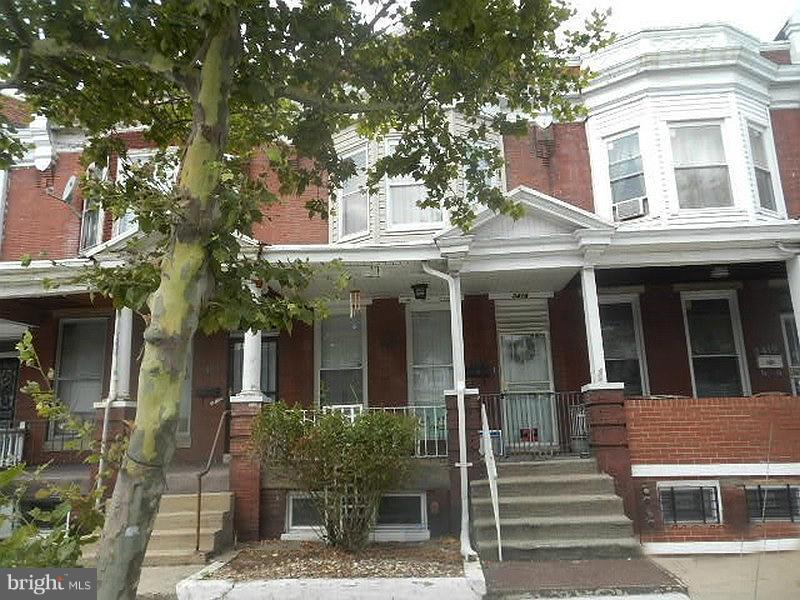 Don't miss this valued priced brick rowhome in Baltimore City. Enjoy spacious room sizes, carpet flooring, eat-in kitchen with tiled floors & Corian counter, master suite with bay windows & built-in closet. and fully finsihed basement with recreation room & half bath. The front porch is perfect for warm weather fun. Convenient location. Near schools, shopping and minutes from Downtown Baltimore.