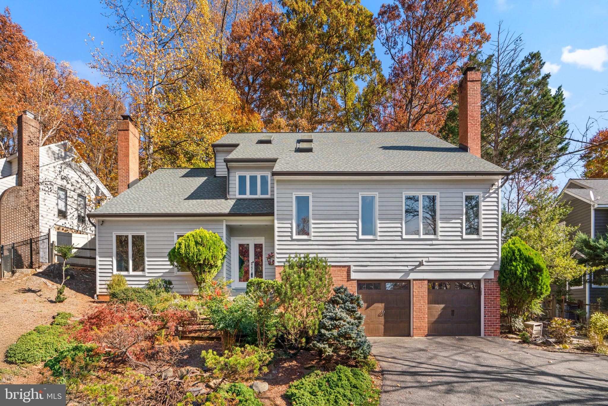 A stunning contemporary-style home featuring 4 bedrooms and 3.5 bathrooms, spanning 3,765 square feet. This spacious residence offers an ideal blend of modern updates and elegant design, with striking vaulted ceilings that create a sense of openness and light. The inviting family room features a gas fireplace and impressive vaulted ceilings, perfect for cozy evenings and gatherings. Throughout the home, you'll find beautiful hardwood floors and the updated kitchen with sleek granite countertops, center island, and stainless-steel appliances, ideal for both everyday cooking and entertaining. The lower level has been enhanced with new LVP flooring, adding style and durability, while a versatile flex space on the upper level offers endless possibilities for a home office, gym, or room to relax. Enjoy all 4 seasons bird watching from the covered porch with views of the garden filled with a variety of flowering shrubs and plantings.  Located very close to commuter routes, 495, Macarthur Blvd, Old Angler’s Inn, and Tysons Corner which is only a 15 minute drive.  Carderock ES, Pyle MS, Whitman HS.  Don’t miss the opportunity to make this beautiful home yours!