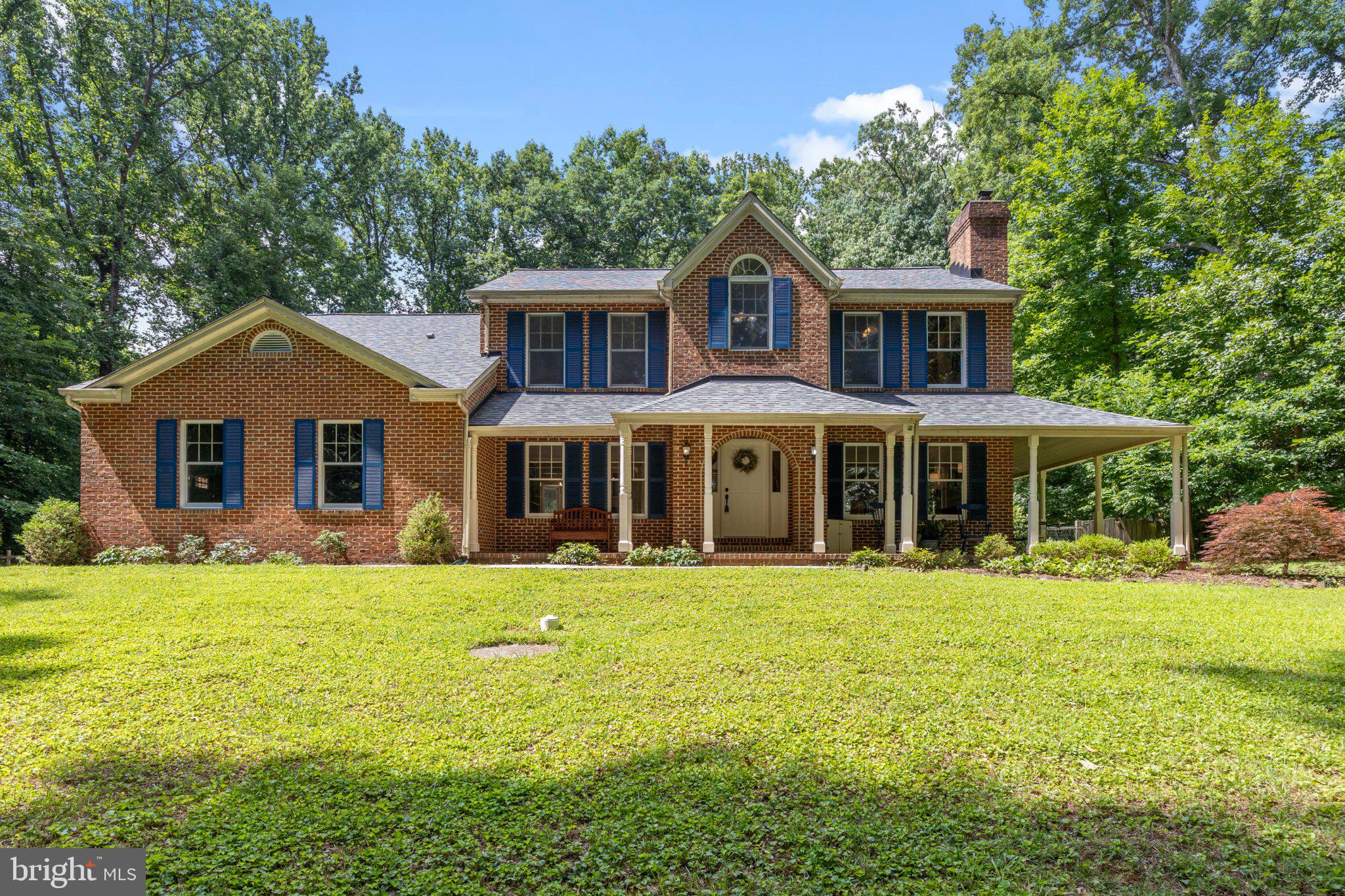Welcome home to this stunning custom-built colonial nestled in the highly desirable Kingsville community. Situated on a beautiful professionally landscaped lot, this exceptional four-bedroom, four-bath residence offers the perfect blend of timeless elegance, modern updates, and resort-style outdoor living.
When you arrive, you'll be captivated by the inviting wraparound covered concrete front porch, an ideal place to relax and enjoy the peaceful surroundings. The fully fenced backyard is truly an entertainer's dream, featuring a spacious 21' x 14' concrete patio and a screened pool house complete with a convenient kitchenette and half bath.
The heated 36' x 18' in-ground pool (approximately 32,000 gallons) creates your own private backyard oasis. Recent improvements include a new pool pump (2021), filter (2023), liner (2023), and propane heater (2025). Two leased 60-gallon propane tanks efficiently heat the pool, extending your swimming season.
Inside, you'll find a spacious and thoughtfully designed floor plan showcasing beautiful hardwood flooring, new carpeting, soaring ceilings, and custom craftsmanship throughout. The dramatic two-story family room features a floor-to-ceiling brick fireplace with a wood-burning insert, window seats overlooking the backyard, custom wet bar with beverage refrigerator and glass rack, and an overlook from the second level that enhances the home's open, airy feel.
The gourmet kitchen is designed for both everyday living and entertaining, offering a large center island, abundant cabinetry, and an adjoining breakfast room. Kitchen updates include a refrigerator (2024) and dishwasher (2021). The attached two-car garage, featuring new garage doors and automatic openers (2023), opens conveniently into the mudroom just off the kitchen.
The main level also includes a formal dining room, elegant living room, private office, and a welcoming foyer, providing flexible spaces for work, family gatherings, and entertaining.
Retreat to the luxurious primary suite through double-door entry, where you'll enjoy vaulted ceilings, an expansive walk-in closet with custom built-in organizers, and a spa-inspired ensuite bath featuring a jetted tub, separate walk-in shower, and generous vanity space. A second-floor laundry room offers added convenience. 
The fully finished lower level expands your living space with custom built-ins, a beautiful wet bar, a dedicated workout room with rubber flooring, a large workshop, an additional craft or storage room, and a convenient half bath.
Additional highlights include:
• New roof (2025)
• Four spacious bedrooms and four bathrooms
• Hardwood flooring and new carpet
• Two fireplaces, including one with a wood-burning insert
• Custom built-ins throughout
• Fully fenced, professionally landscaped yard
• Wraparound covered concrete front porch
• Mudroom entry from attached garage
• Exceptional storage and functional living spaces