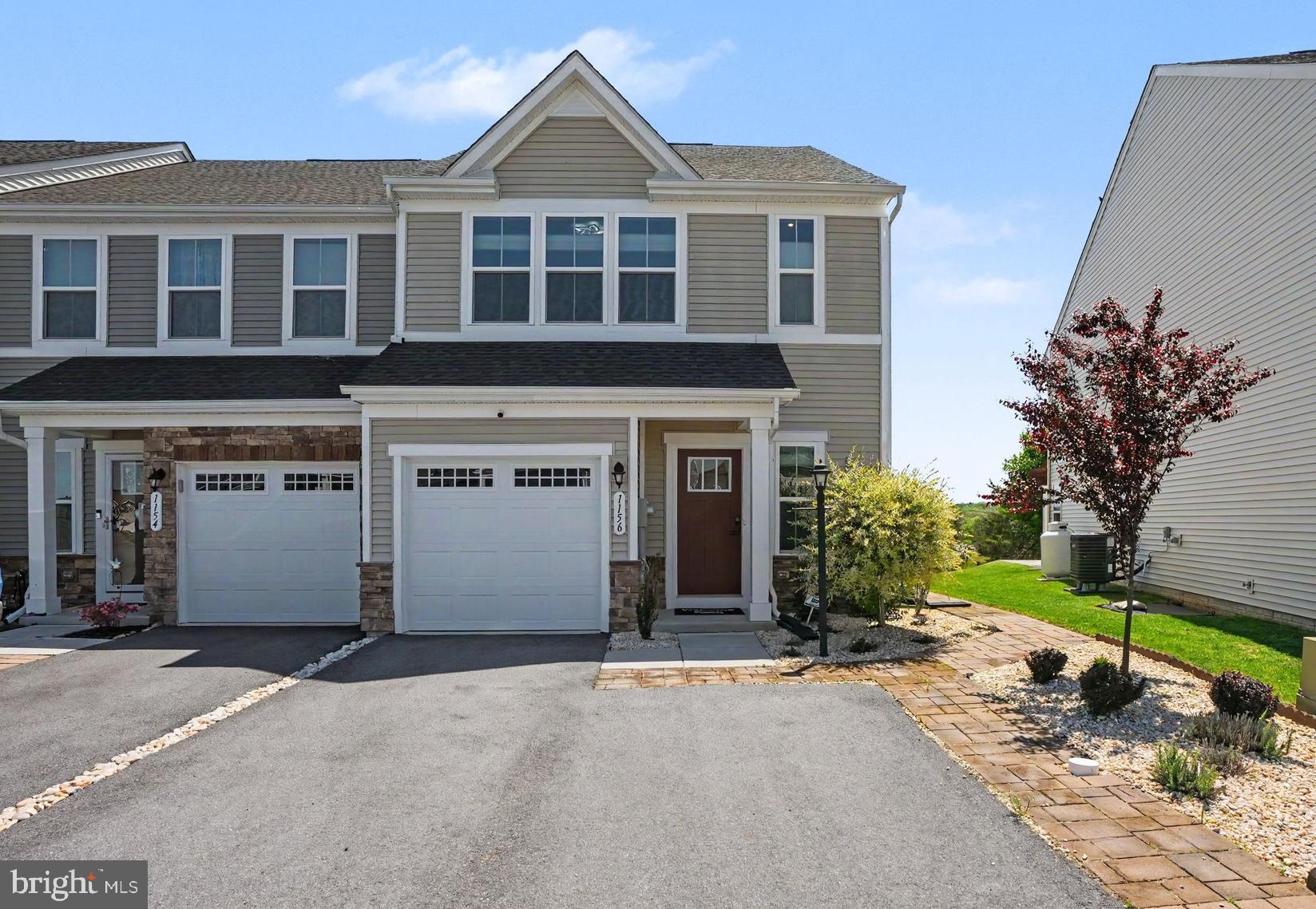 Welcome to 1156 Emilys Court! Built in 2023 and beautifully maintained, this like-new end-unit townhome at 1156 Emilys Court is ready for its new owner. Used only as a secondary home, the property has been lightly lived in and feels practically brand new. Featuring 3 bedrooms and 2.5 bathrooms, the open-concept layout provides a bright and inviting atmosphere with stylish finishes throughout. Enjoy the added privacy of an end unit along with a private rear patio overlooking scenic pasture views — the perfect place to relax and take in the quiet countryside setting. Conveniently located in the desirable Rolling Hills community, this home offers low-maintenance living with a serene backdrop you’ll love coming home to! Schedule your showing today!