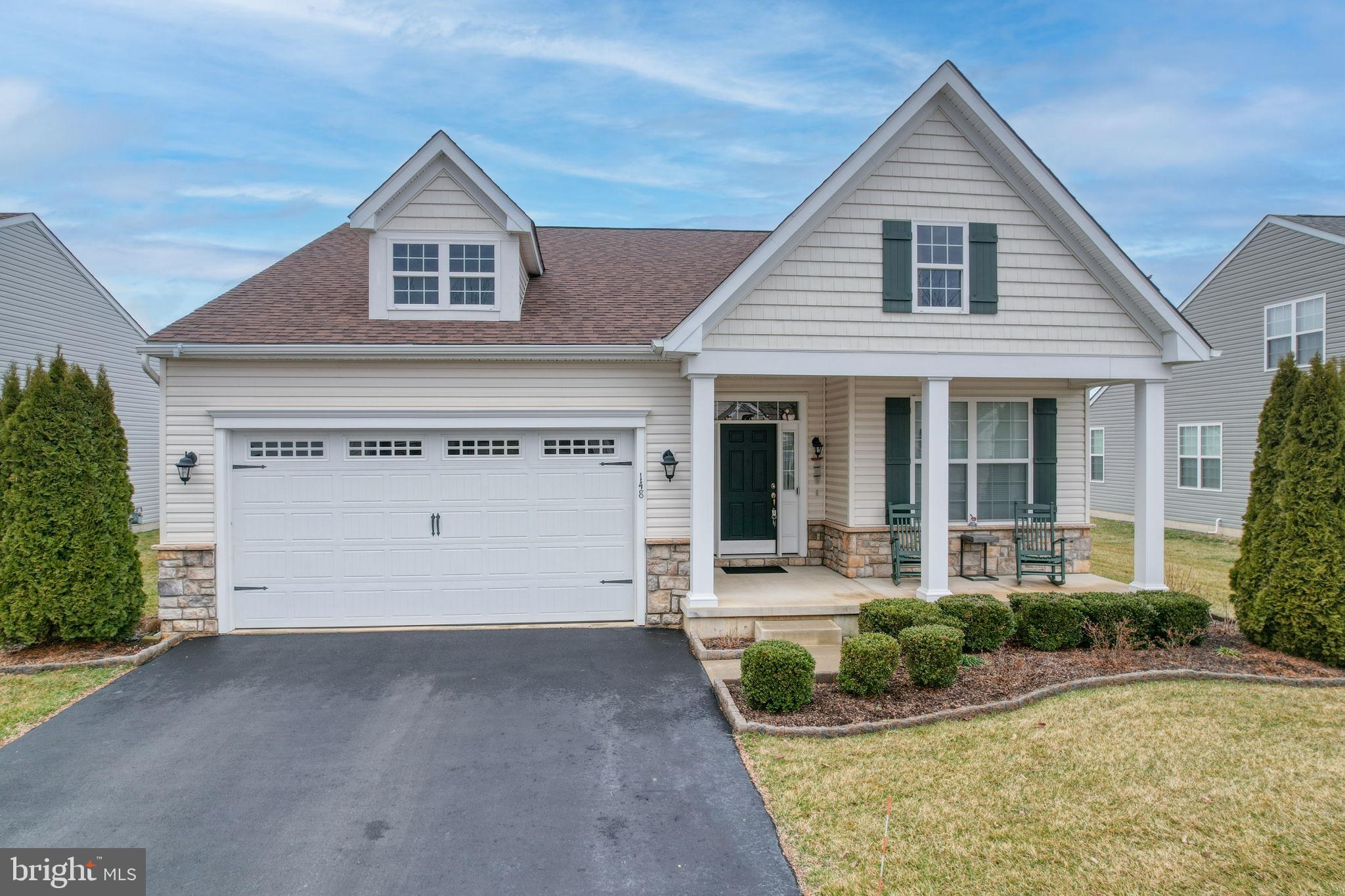 WOW! Simply Gorgeous! This popular Kipling model offers open floor plan, foyer with 11 FT ceiling, wainscoting and gleaming hardwoods extending from foyer thru living room, dining room and kitchen. Well appointed kitchen has granite counters including island with seating for 3, stainless steel appliances, recessed & upgraded lighting. Dining area has sliders to upgraded & enlarged paver patio, upgraded landscaping with paver edging, wonderful front porch & irrigation system. Primary bedroom has plush carpeting, tray ceiling, walk-in closets and full bath with raised height vanity, walk-in tiled shower and beautiful ceramic tiled floor. 2nd bedroom is close to the entry door and another full bath. Main floor laundry room has tiled floor, cabinets, wash tub and washer & dryer included. Additional 2nd floor 12 X 15 Storage Room and storage in the crawl space.This sensational home is located in the premier 55+ Community of Spring Arbor offering a clubhouse, heated salt water pool, bocci ball courts, picnic area, fitness room, immense gathering room with kitchen facilities, library and game rooms including billiards. Great location close to major roads, walking distance to restaurants and shopping..