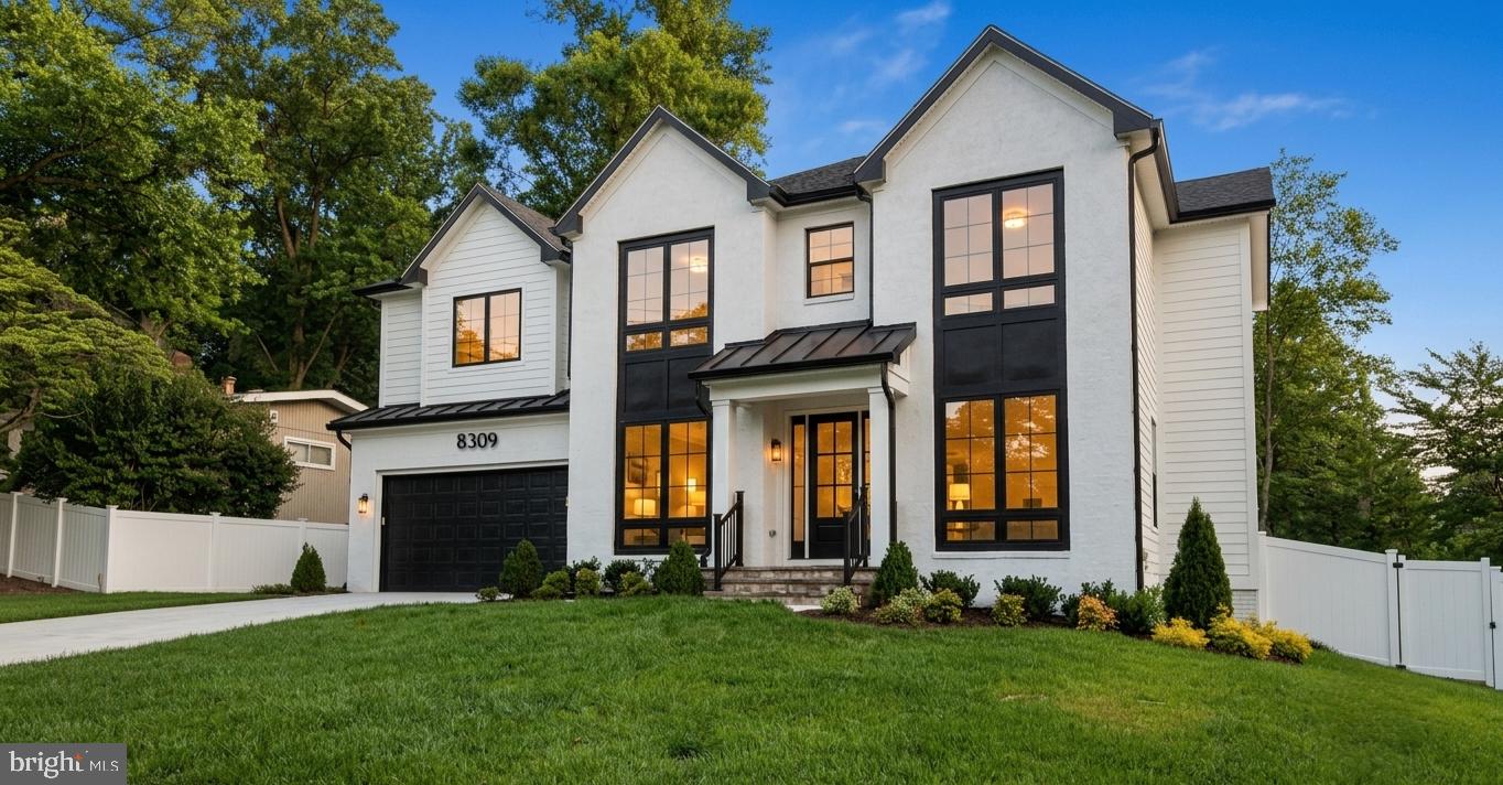 Step inside this stunning 6,500 sq. ft., 7-bedroom, 6.5-bath home featuring beautiful transitional architecture. The chef's kitchen is built for serious cooking and entertaining, outfitted with a massive 72" Sub-Zero refrigerator and a professional Wolf range. From the luxurious main-level bedroom suite to the high-quality finishes across all four floors, every detail has been carefully planned to make this a standout home in the highly desirable Whitman cluster. Sitting on one of the highest points in the neighborhood, the property offers fantastic views. The backyard was designed for easy outdoor living, featuring a huge, expansive deck and a fully fenced yard for low-maintenance privacy. MOVE-IN READY! 10-YEAR BUILDER WARRANTY.