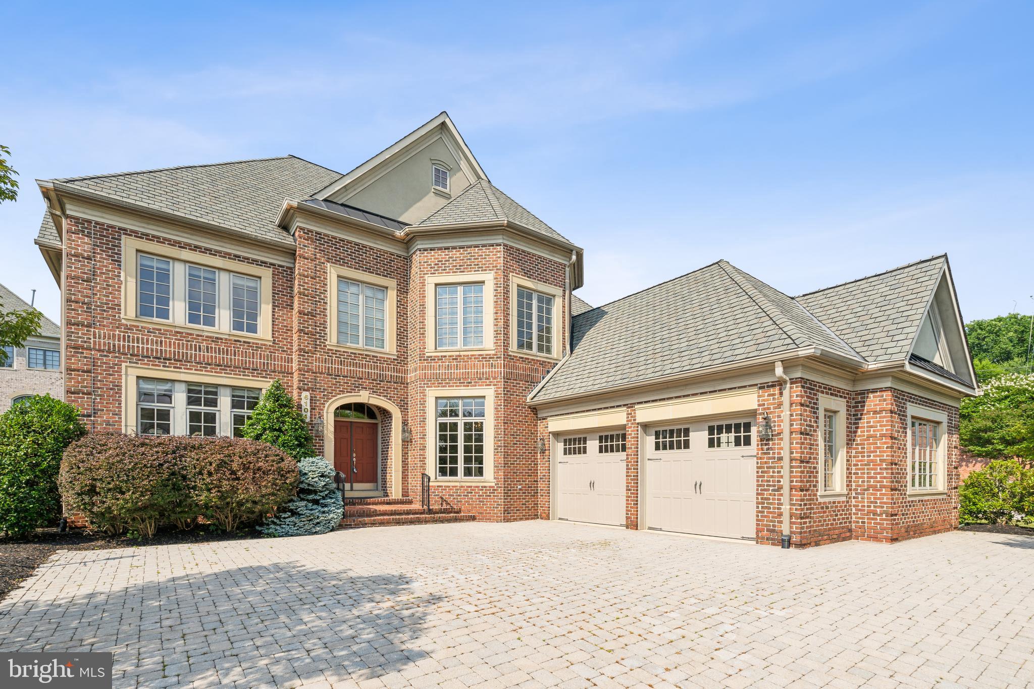 Welcome to a luxury enclave of homes in one of North Bethesda's most sought-after neighborhoods! Elegant finishes and modern comfort set the tone for this spacious and comfortable home.  Features 10' ceilings on the main level, 9’ ceilings on the upper and lower levels.  Hardwood flooring on the main and upper levels.  Enter a gracious, wide central foyer opening onto both formal living and dining rooms and an office.  The window filled family room has a stone front gas fireplace.  The gourmet eat-in kitchen showcases 42" Yorktowne cabinetry, large island with prep sink, granite counters and stainless appliances.  The kitchen opens to the backyard deck. The upper level features a primary suite that includes an 18x14 walk-in closet, and luxury bath with two vanities, spa tub, separate shower and private water closet. Bedroom 2 has a walk-in closet and ensuite bath.  Bedrooms 3 and 4 each have walk-in closets and a half bath and share the tub/shower room.  The lower level has a large family room with wet bar, potential media room, exercise room, half bath, storage room and bedroom 5 with an ensuite bath.  The low-maintenance exterior has 4 sides brick and was professionally landscaped.  The HOA maintains lawns in the community and has a nature pond as well as a tot lot just one block away. This home is ideally located. Easy access to 495, 270 and Grosvenor Metro, Wildwood Shopping Center, Westfield Mall, Pike and Rose, Cabin John Park and many shopping options are close by.