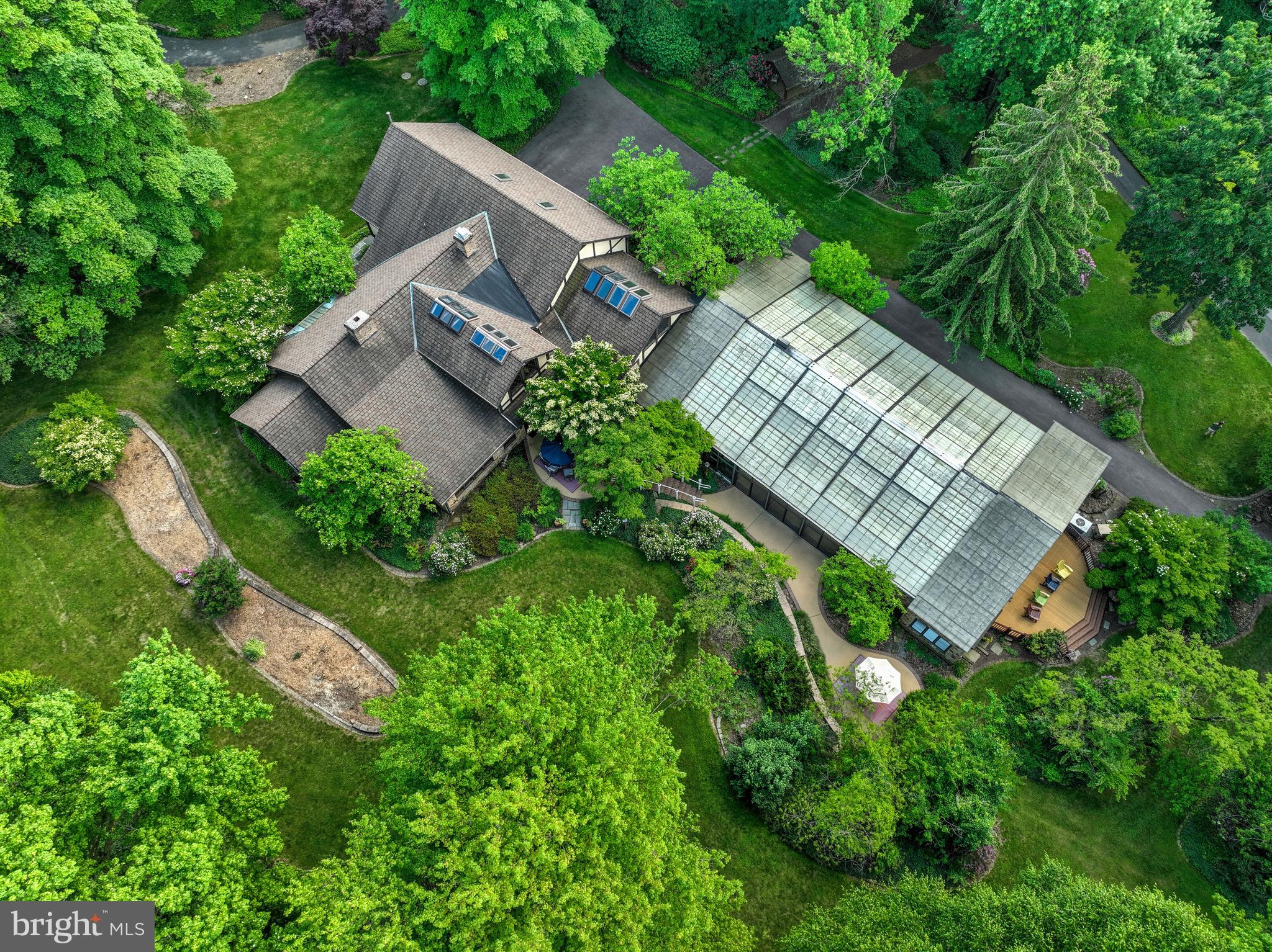 Live your best life in this stunning resort-like property, featuring a main home currently used as a bed and breakfast and a charming carriage house. Located just 2 miles from downtown Ephrata in Lancaster County, this multi-level estate offers unmatched luxury and comfort.

The main home boasts 5 spacious bedrooms, including one with a private entrance and accessibility features. There are 5 full bathrooms and an additional half bath. The highlight of the home is the indoor heated in-ground pool, surrounded by wall-to-wall windows and crowned with cathedral ceilings and skylights. This entertainment dream includes a kitchenette area with a stovetop, mini fridge, and plenty of seating.

Spread over 5 acres of beautifully landscaped land, the property includes multiple gazebos and gardens, a tennis court, and sprawling decks perfect for outdoor gatherings. The carriage house features 3 bedrooms, 2 full baths, and a total of 13 bay garages, ideal for car enthusiasts or extra storage. 

Additionally, the property includes a home generator for peace of mind. The main home benefits from geothermal heating, ensuring comfort year-round. Whether you choose to make this unique property your private residence or explore the potential for in-law quarters or rental opportunities, the possibilities are endless.

Discover the endless opportunities this exceptional property offers and enjoy the luxury of resort-style living every day.