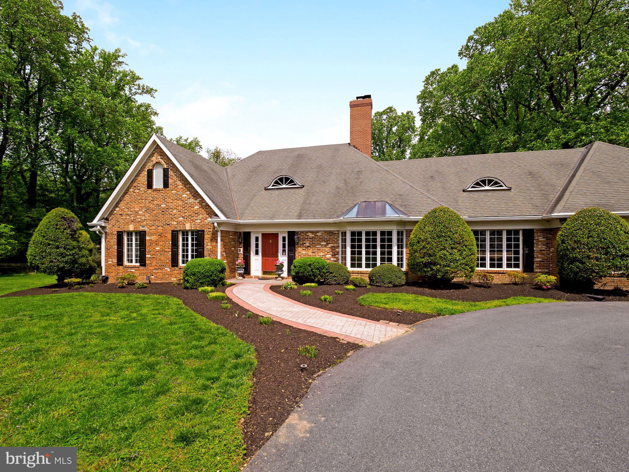 CONTRACT HAS BEEN RATIFIED AND THE OPEN HOUSE IS CANCELLED. Looking for a lovely home in close-in Potomac with a pool, sprawling lawn, screened porch, main level bedrooms and in-law suite? This is it! This large, lovely Rambler sits on a serene, level  two+-acre corner lot minutes from Potomac Village, was re-built and en-larged in 1997 and has two fully finished levels with 5,000+ square feet of space to enjoy. Beautiful Main Level Owners Suite with fireplace, luxury Bath and views of the grounds. In-Law Suite with separate entrance on main level. Lovely Living Room with bay window and fireplace. Library/ Office with built-ins. Elegant Dining Room with tray ceiling. Gourmet Kitchen with center isle and double sinks. Breakfast area. Family Room with fireplace.  Nicely finished lower level with large Recreation Room, 5th Bedroom, full Bath, Media Room, and more. A circular driveway leads to the home. A large entry Foyer with tray ceiling welcomes guests. Lovingly designed by its owners, who built the house on the site of an old 50's rambler, giving it a raised roof and spacious flow with high ceilings, with French country style in mind. There are many extra features including a detached garage with space for three cars, gazebo, hardwood and porcelanosa floors, beautiful moldings, wide hallways, three fireplaces, recessed lighting, a generator, nice built-ins and steam shower. The 20' by 40' pool is fenced and has an automatic pool cover. You will love this home and the incredibly serene setting!