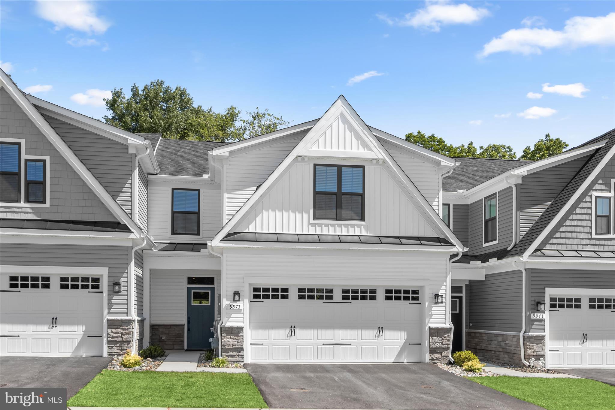 Welcome to this stunning, like-new Craftsman-style interior row townhouse condominium located in the highly desirable Bethany Glen 55-plus active adult community. Built in 2025 by Ryan Homes, this sought-after Caroline model offersa perfect blend of main-level convenience and expansive, luxury living space. The main level features a thoughtfully designed family entry directly off the attached two-car garage, leading into a light-filled, open-concept floor plan. At the heart of the home is a gorgeous gourmet kitchen equipped with stainless steel energy-efficient appliances, premium countertops, a pantry, and a sprawling center island that seamlessly overlooks the formal dining area and welcoming great room. The main-level primary suite serves as a private retreat, complete with an elegant tray ceiling, a spacious walk-in closet, and a luxurious dual-vanity bathroom. The upper level boasts three additional large bedrooms and a full bath, providing comfortable accommodations for guests or family members. Expanding the home's footprint significantly, the finished lower level offers a massive recreation room, a full bathroom, and a generous, separate unfinished storage area. Additional highlights include a two-car front load garage with a dedicated electric vehicle charging station installed in the garage, modern mechanical systems include a multi-zone Energy Star forced air heating and cooling system, a high-efficiency tankless gas water heater. Residents of Bethany Glen enjoy a low-maintenance lifestyle with a monthly fee that covers common area care, lawn maintenance, snow removal, and trash pickup. Neighborhood amenities include access to the community clubhouse, a fully equipped fitness center, a game room, sport courts, and scenic jogging and walking paths.