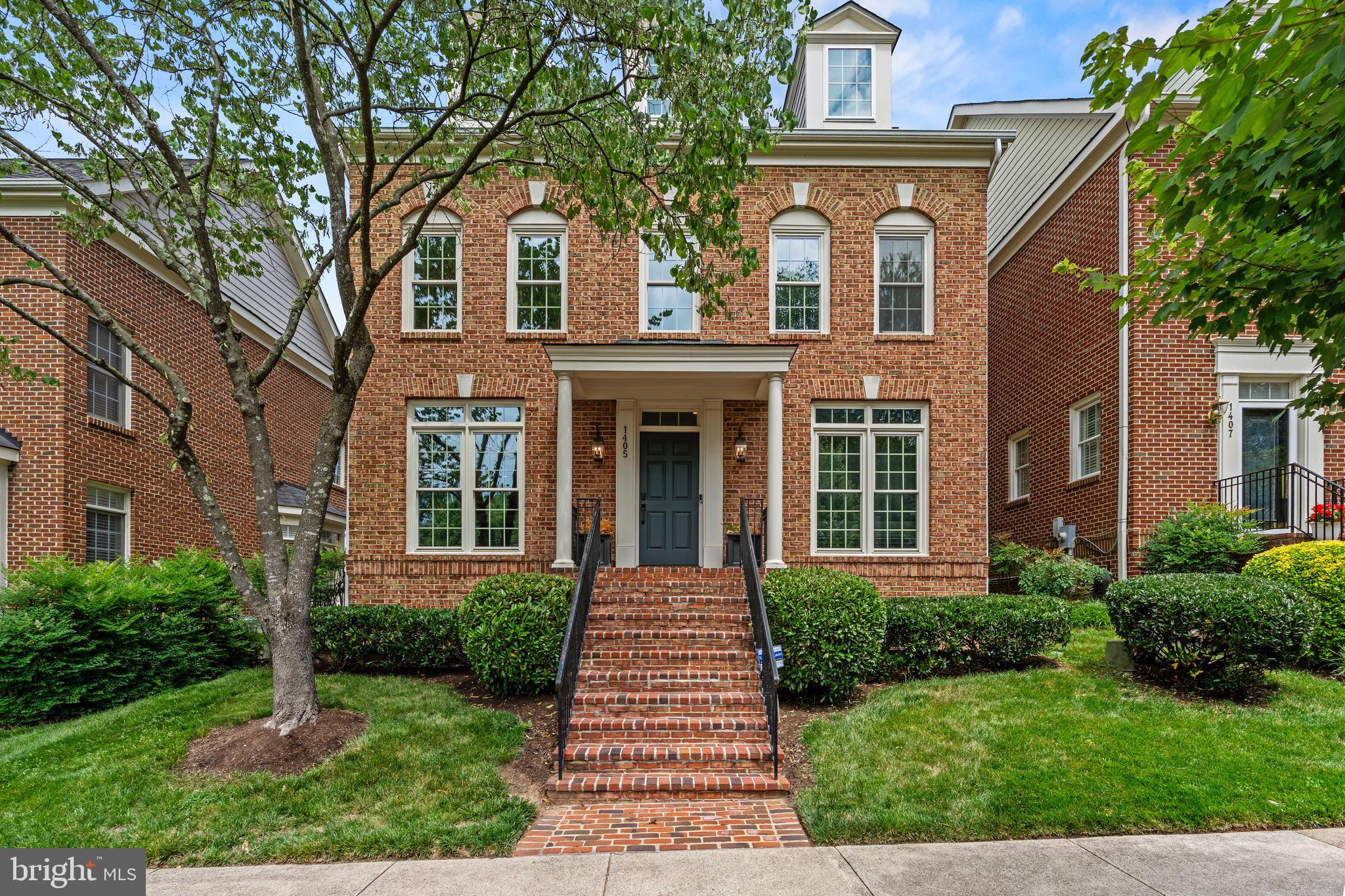 Welcome to 1405 Buena Vista Avenue, a beautifully crafted and meticulously maintained residence in the heart of McLean. Offering approximately 3,600 square feet across three finished levels, this exceptional home features 5 bedrooms, 4 full baths, and 1 half bath, blending timeless architecture with thoughtful modern updates.
The main level showcases an open and inviting floor plan designed for both everyday living and entertaining. Hardwood floors, spacious living and dining areas, and a beautifully appointed kitchen create a warm and functional gathering space. A standout feature is the custom built-in bar on the main level, providing the perfect setting for hosting guests and creating memorable gatherings. Custom windows fill the home with natural light, while elegant finishes and attention to detail are evident throughout.
Upstairs, the luxurious primary suite offers a peaceful retreat complete with a spa-inspired bath and custom walk-in closet. Additional bedrooms provide generous space for family, guests, or flexible work-from-home needs.
The finished lower level offers versatile living space ideal for a recreation room, media area, fitness space, guest suite, or playroom, adapting easily to a variety of lifestyles.
Additional highlights include a two-car garage, multiple living and entertaining areas, and an elevator-ready design for long-term convenience. Ideally located near downtown McLean, parks, shopping, dining, and major commuter routes, this exceptional home offers the perfect combination of luxury, comfort, and location. Rarely does a home blend sophisticated design, functional living, and an unbeatable McLean address so seamlessly.