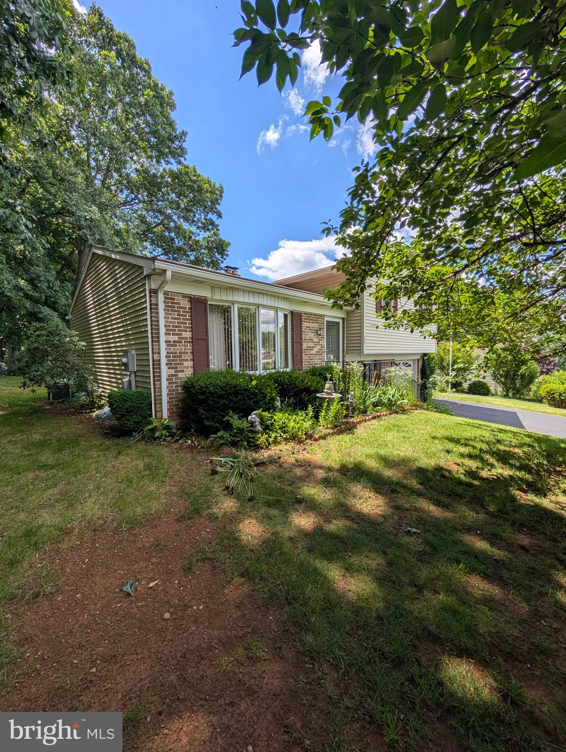 Well-maintained 4-level split offering space, comfort, and a beautiful outdoor setting. Enjoy the inviting 3-season room overlooking a mature backyard featuring a patio sitting area, shaded retreat, two storage sheds, and an abundance of established perennials that provide color and enjoyment throughout the seasons.
The interior has been lovingly cared for and features 3 bedrooms and a full bath on the upper level. The main level offers a spacious living room, dining area, and a country-style kitchen perfect for everyday living and entertaining.
The lower level includes a cozy family room with a wood-burning stove, plus convenient access to the attached garage. An additional bonus level provides flexible space ideal for a recreation room, media room, home office, or man cave, along with access to the laundry area and utilities.
Located in a beautifully maintained neighborhood, this home offers easy access to commuter routes, shopping, and the popular Amish Market. A wonderful opportunity to enjoy comfortable living in an established community